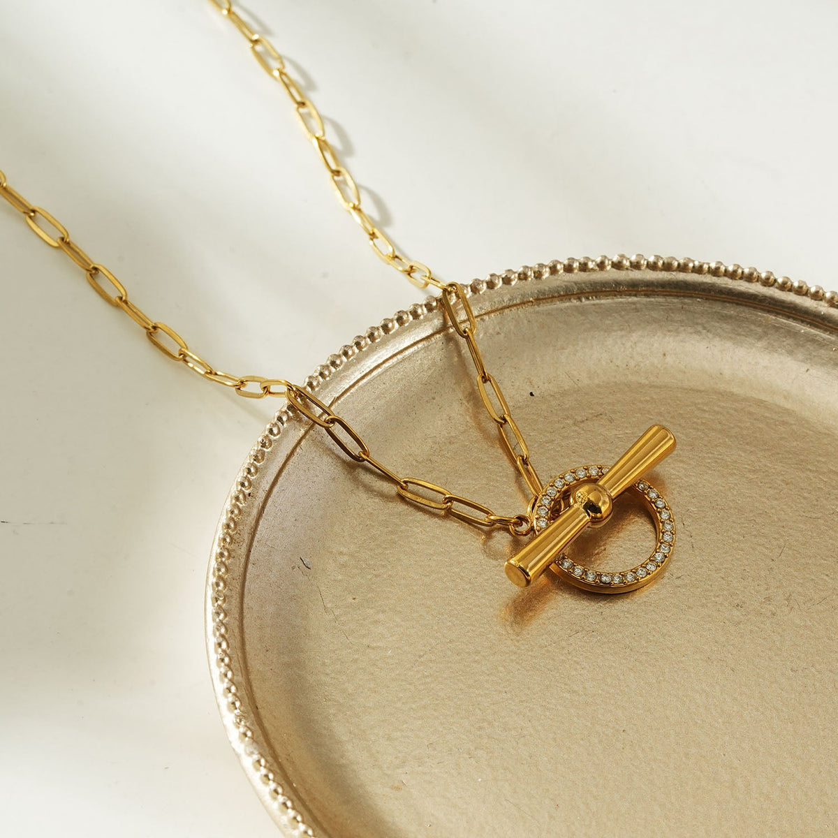 SADIKA Gold: Modern Pavé Zirconia Halo Toggle Necklace