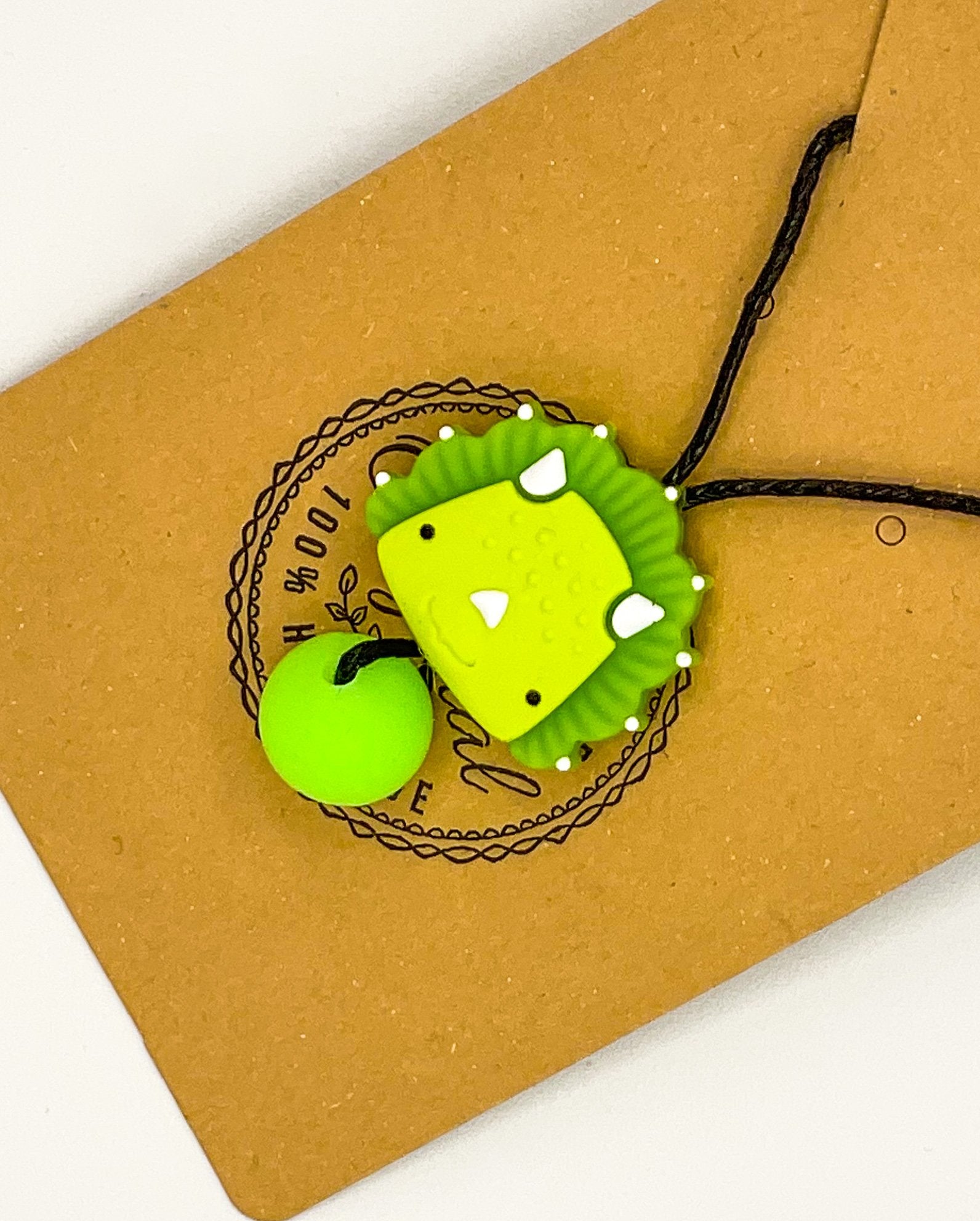 Collier à mâcher dinosaure vert