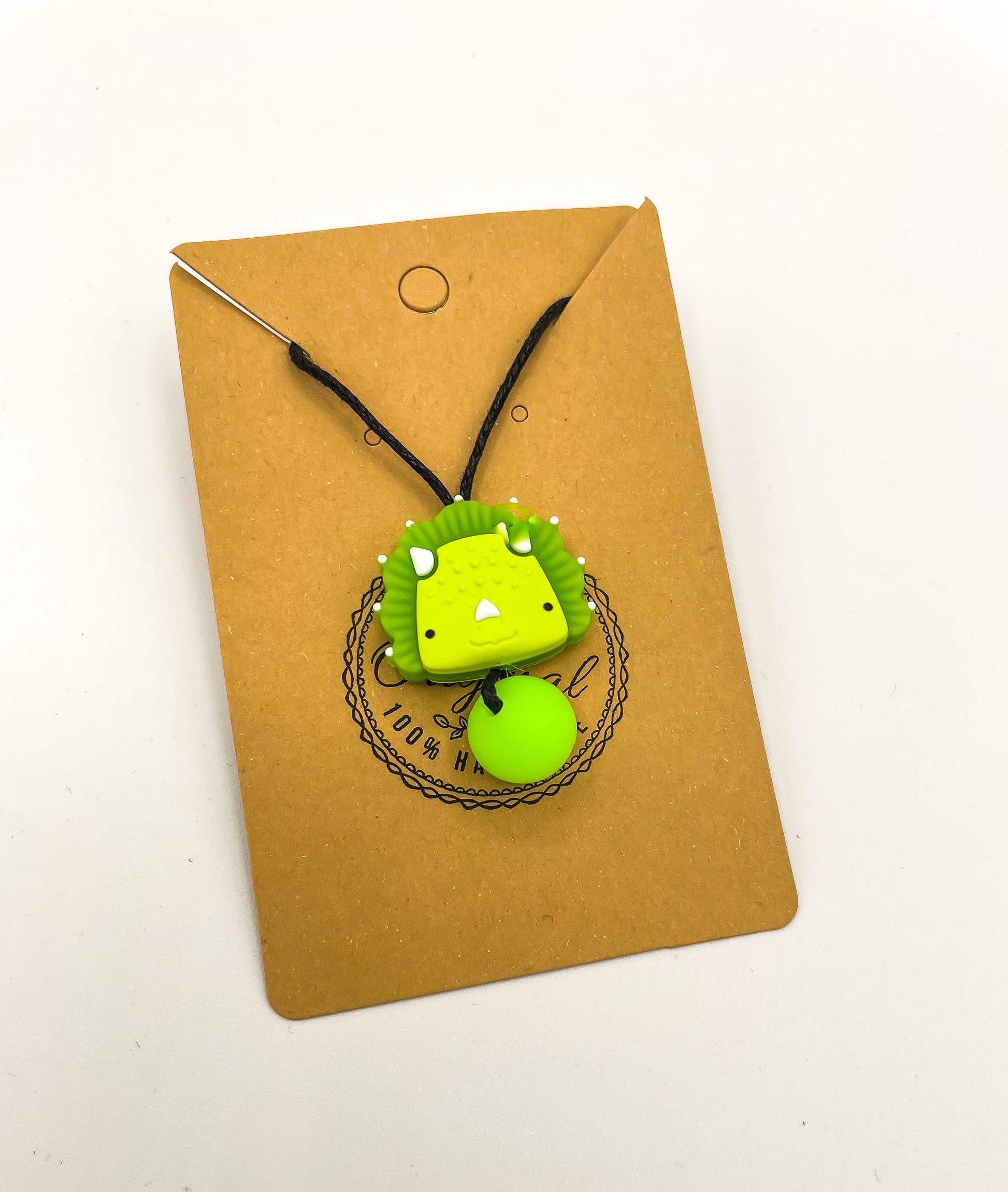 Collier à mâcher dinosaure vert
