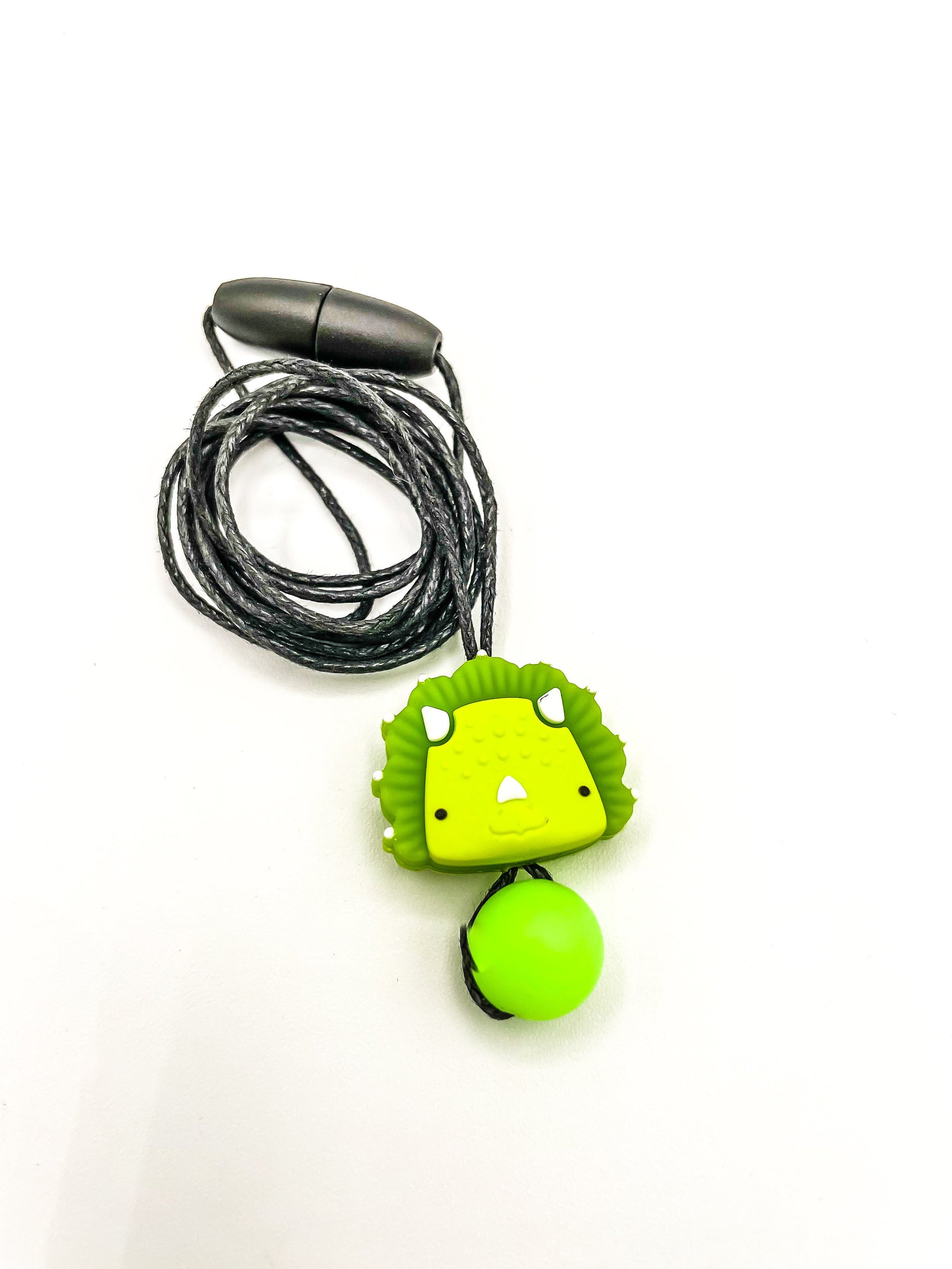 Collier à mâcher dinosaure vert