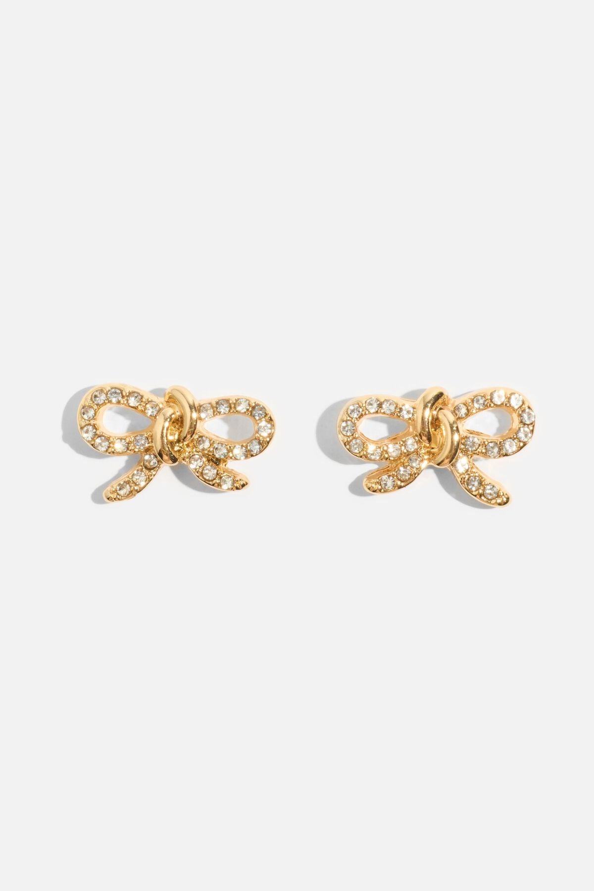 Boucles d'oreilles en forme de nœud noué avec pierres précieuses