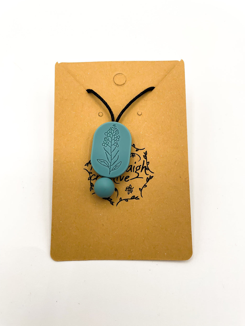 Collier à mâcher ovale à motif floral de moutarde bleue