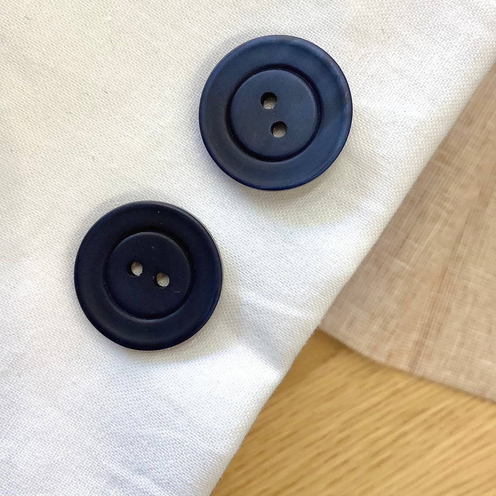 Elan ; Bouton à 2 trous, bleu, 23 mm