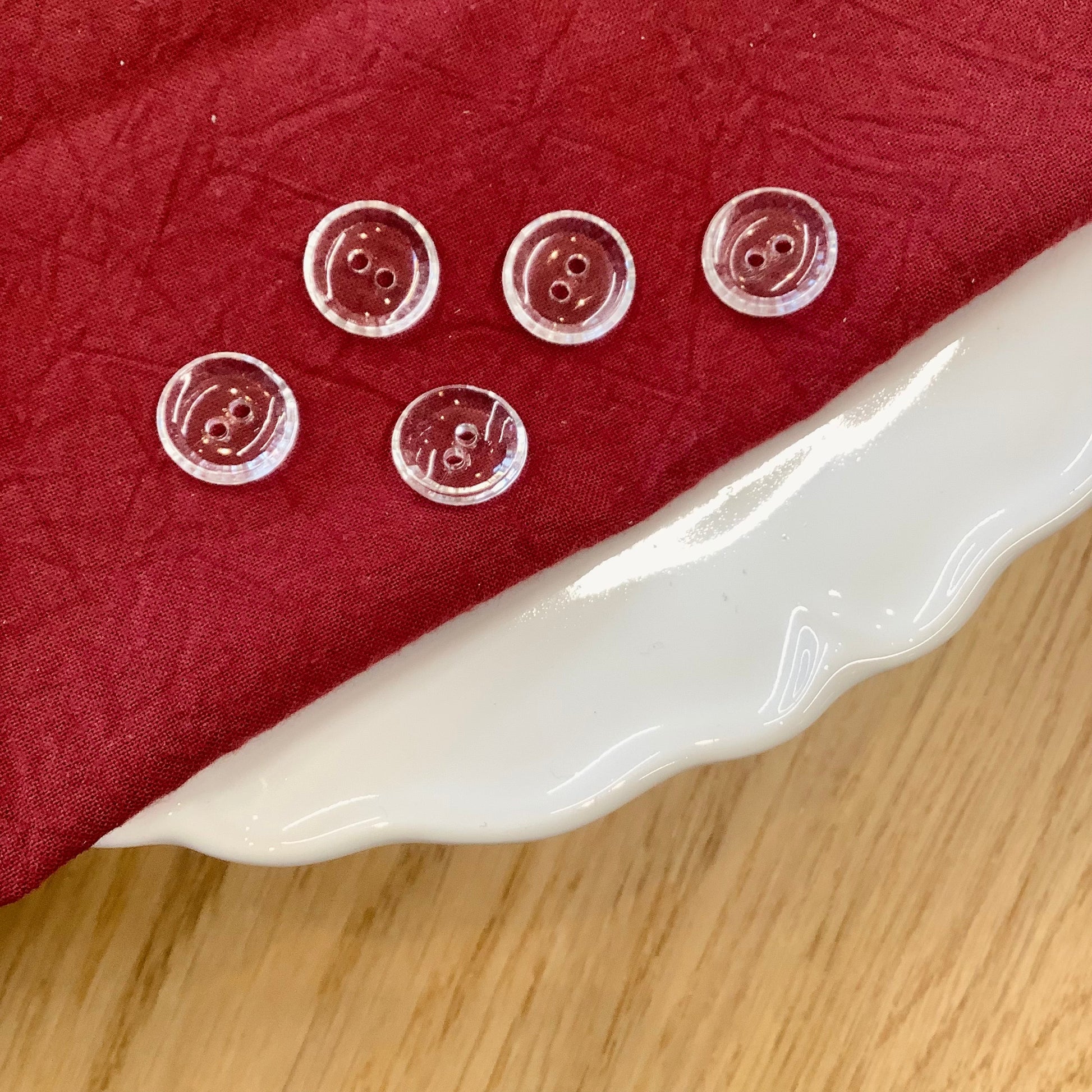 Elan ; Bouton à 2 trous, transparent, 15 mm