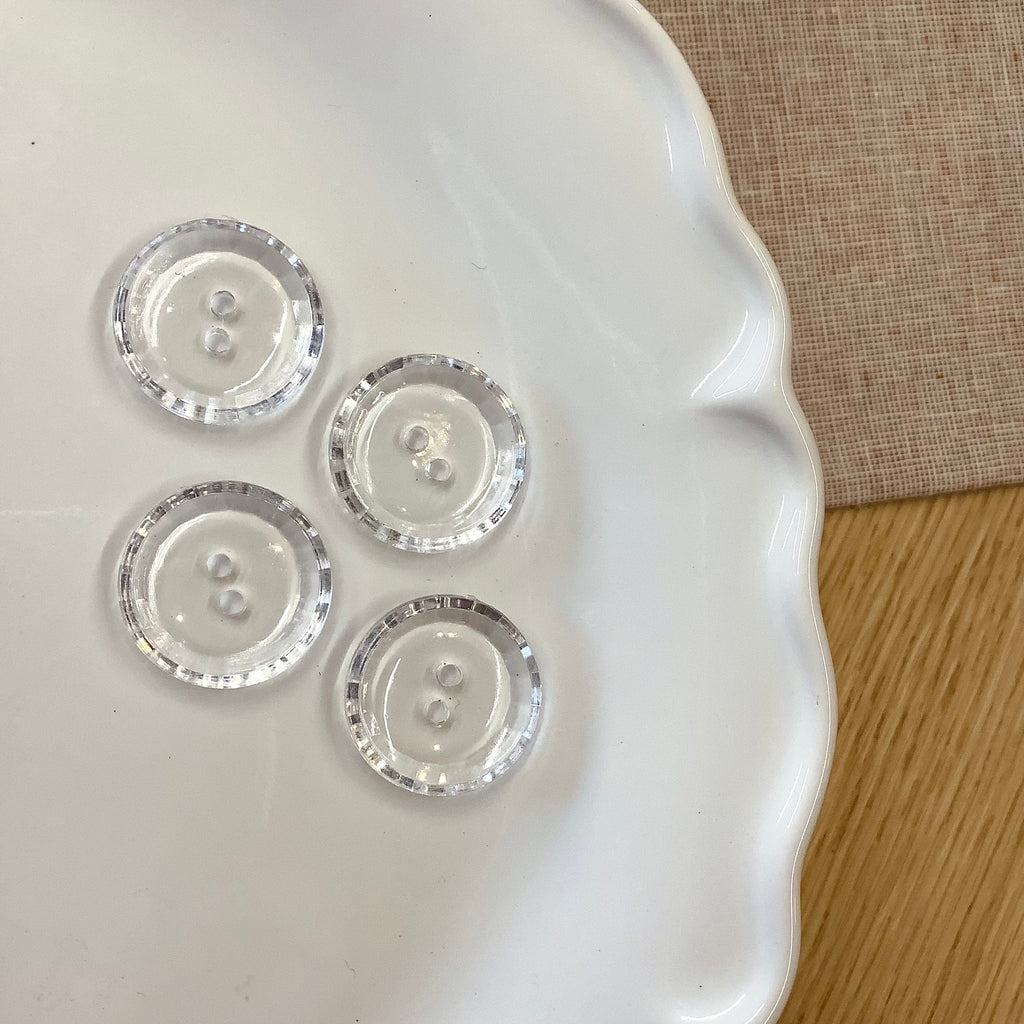 Elan ; Bouton à 2 trous, transparent, 22 mm