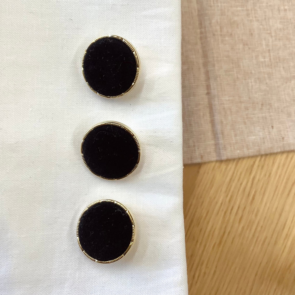 Elan ; Bouton recouvert de velours noir et or, 21 mm