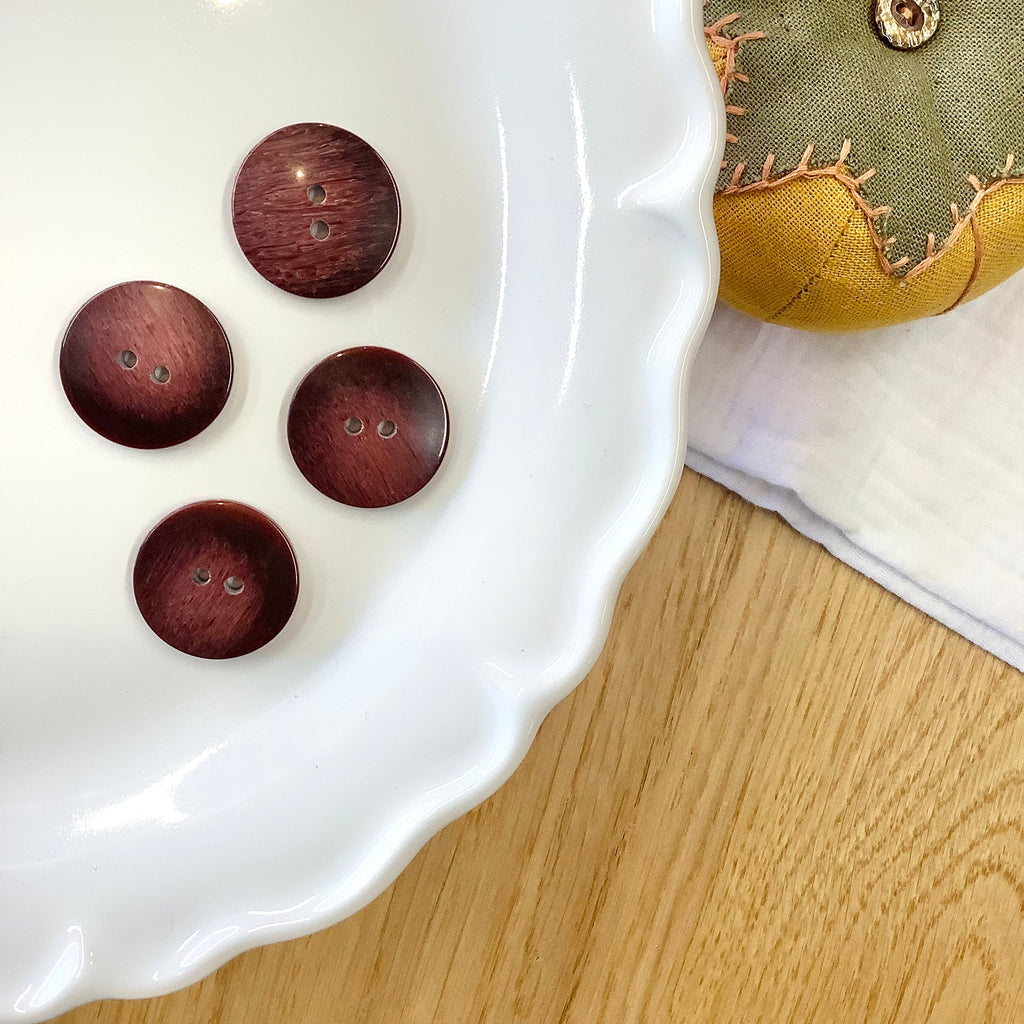 Elan ; Bouton à 2 trous, prune, 23 mm