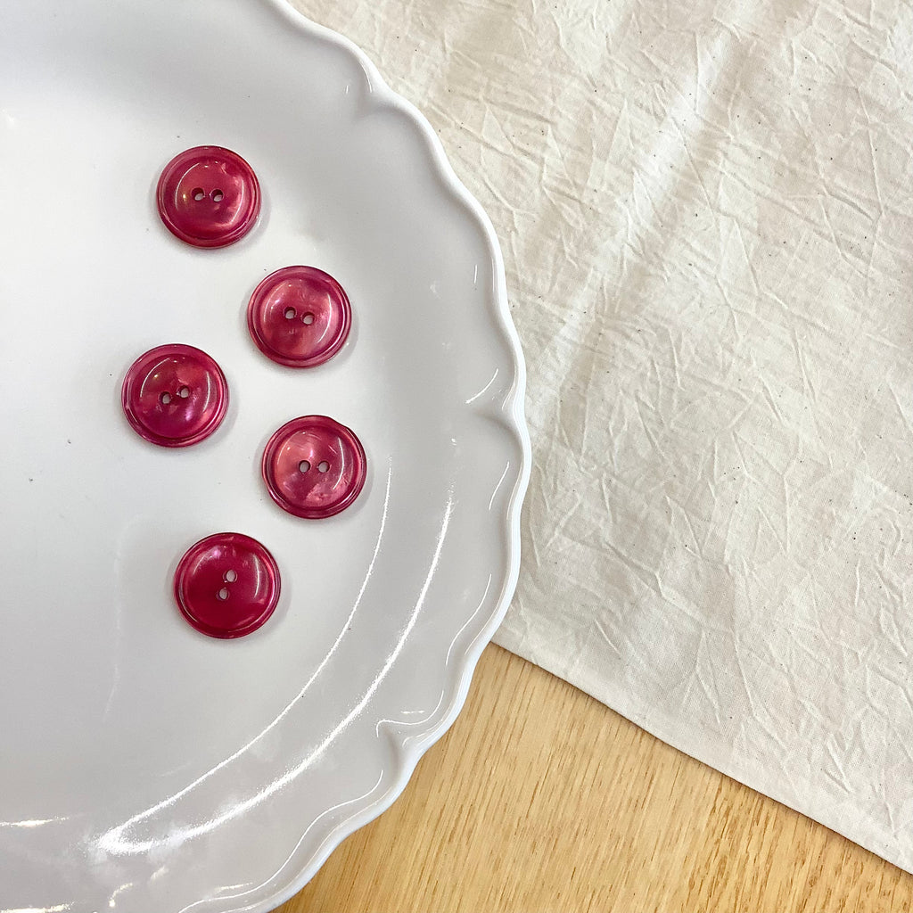 Elan ; Bouton à 2 trous, prune, 23 mm