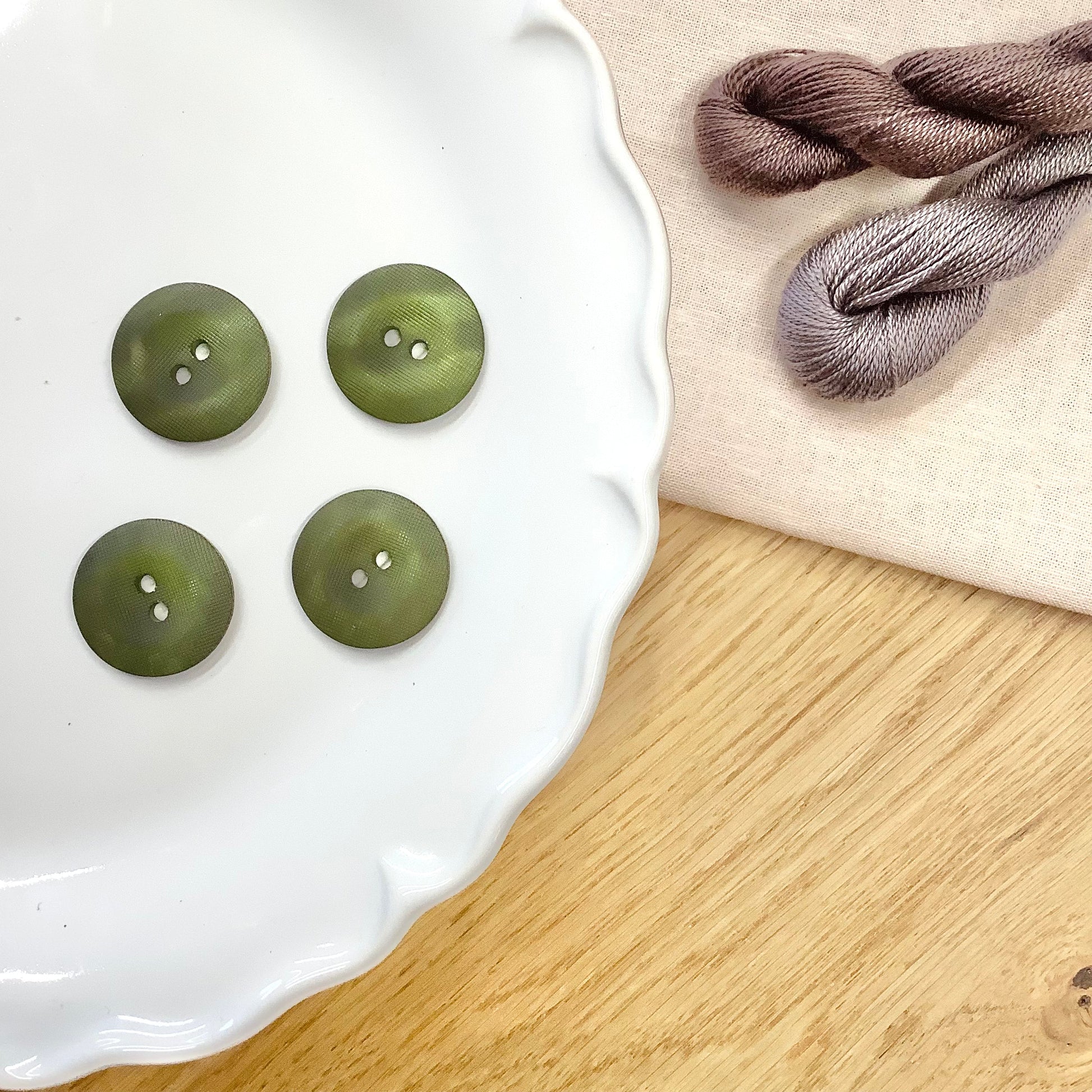 Elan ; bouton à 2 trous, vert, 25 mm