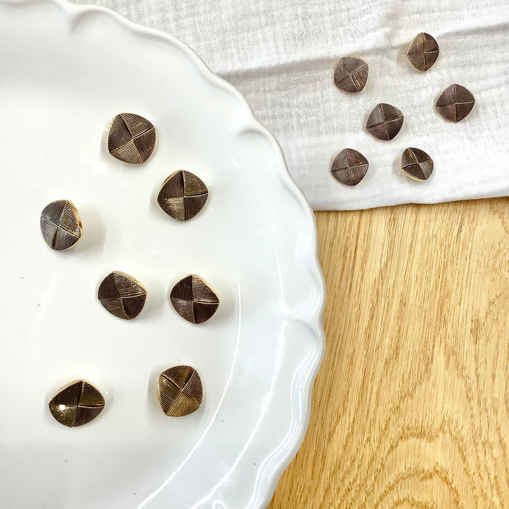 Elan ; Bouton à tige, doré, 18 mm