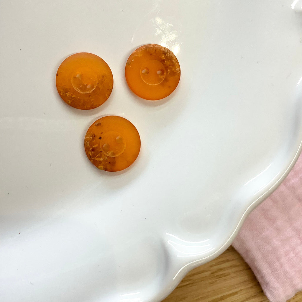 Elan ; Bouton à 2 trous, orange, 15 mm