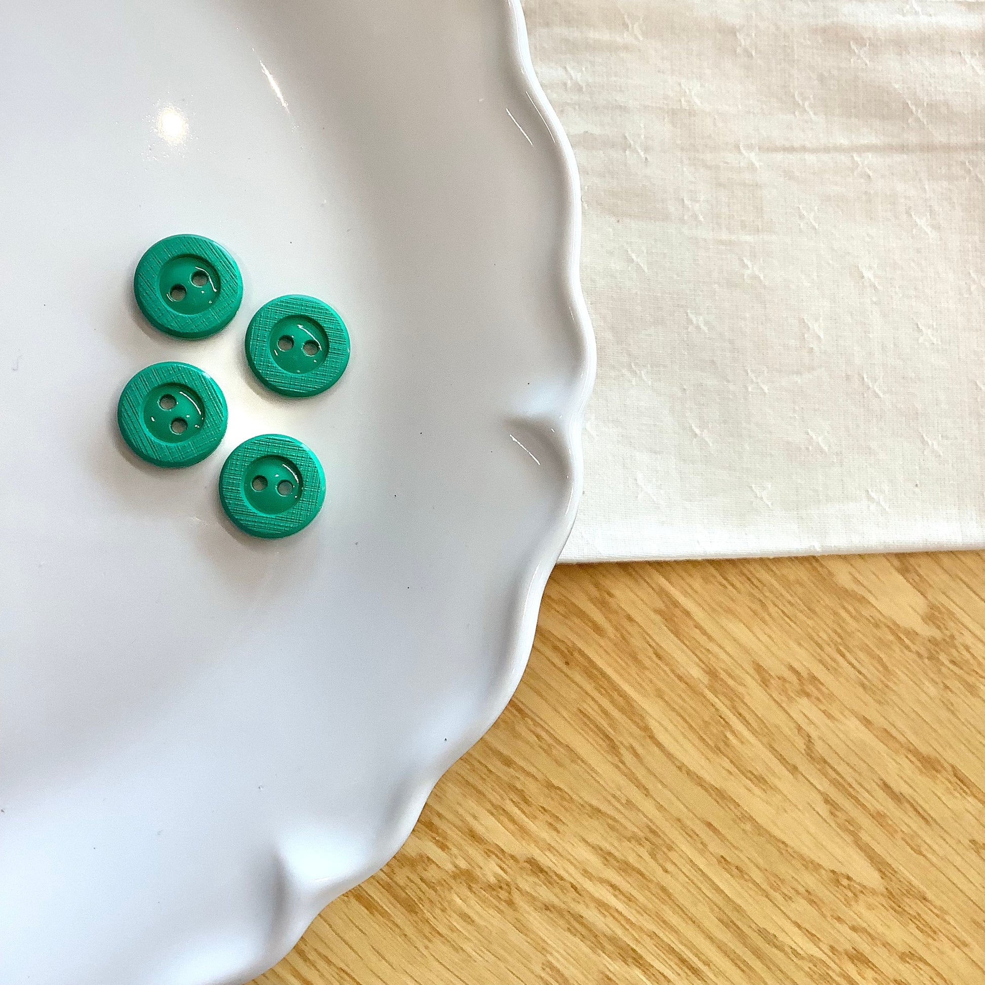 Elan ; bouton à 2 trous, vert, 15 mm