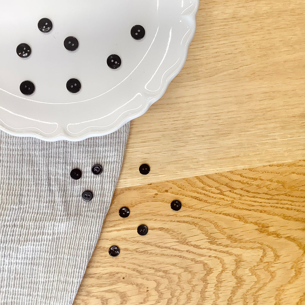 Elan ; bouton à 2 trous, noir - 1/2"