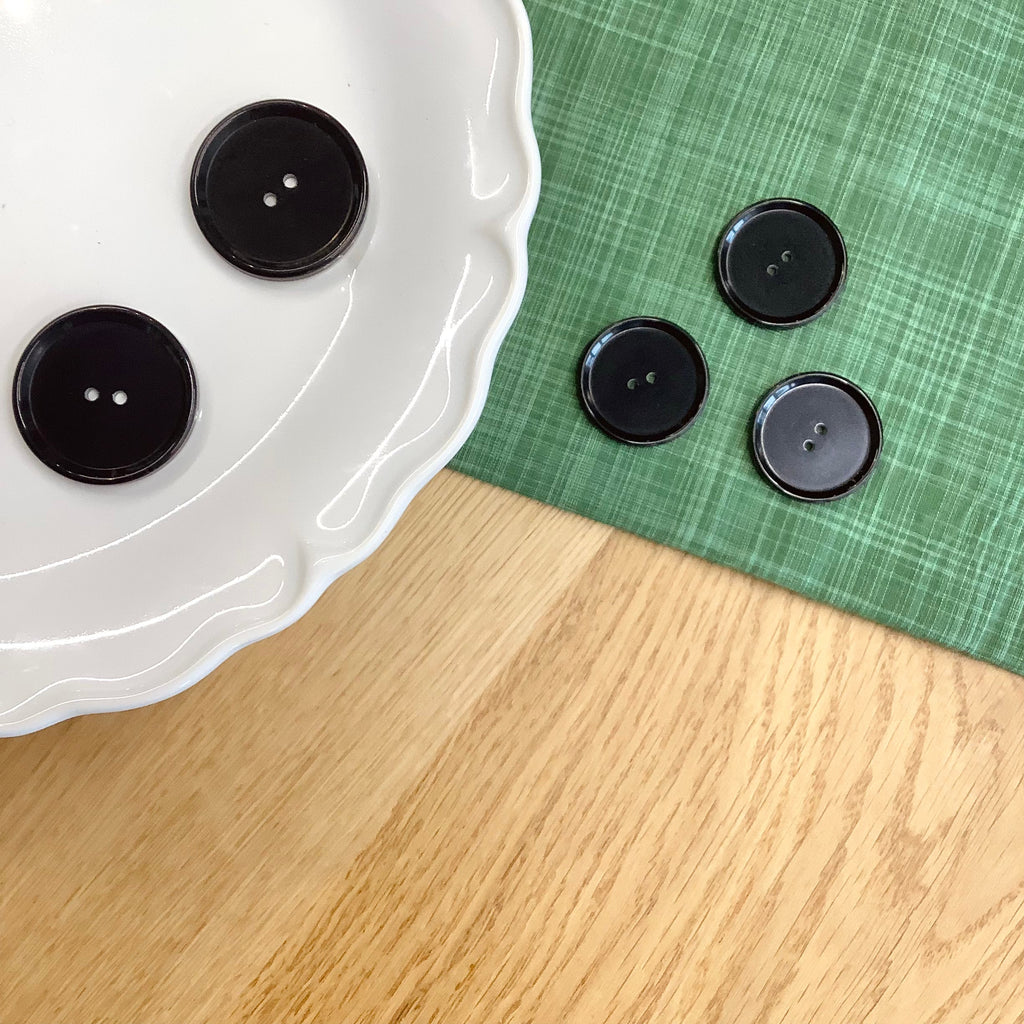 Elan ; Bouton à 2 trous, noir, 34 mm