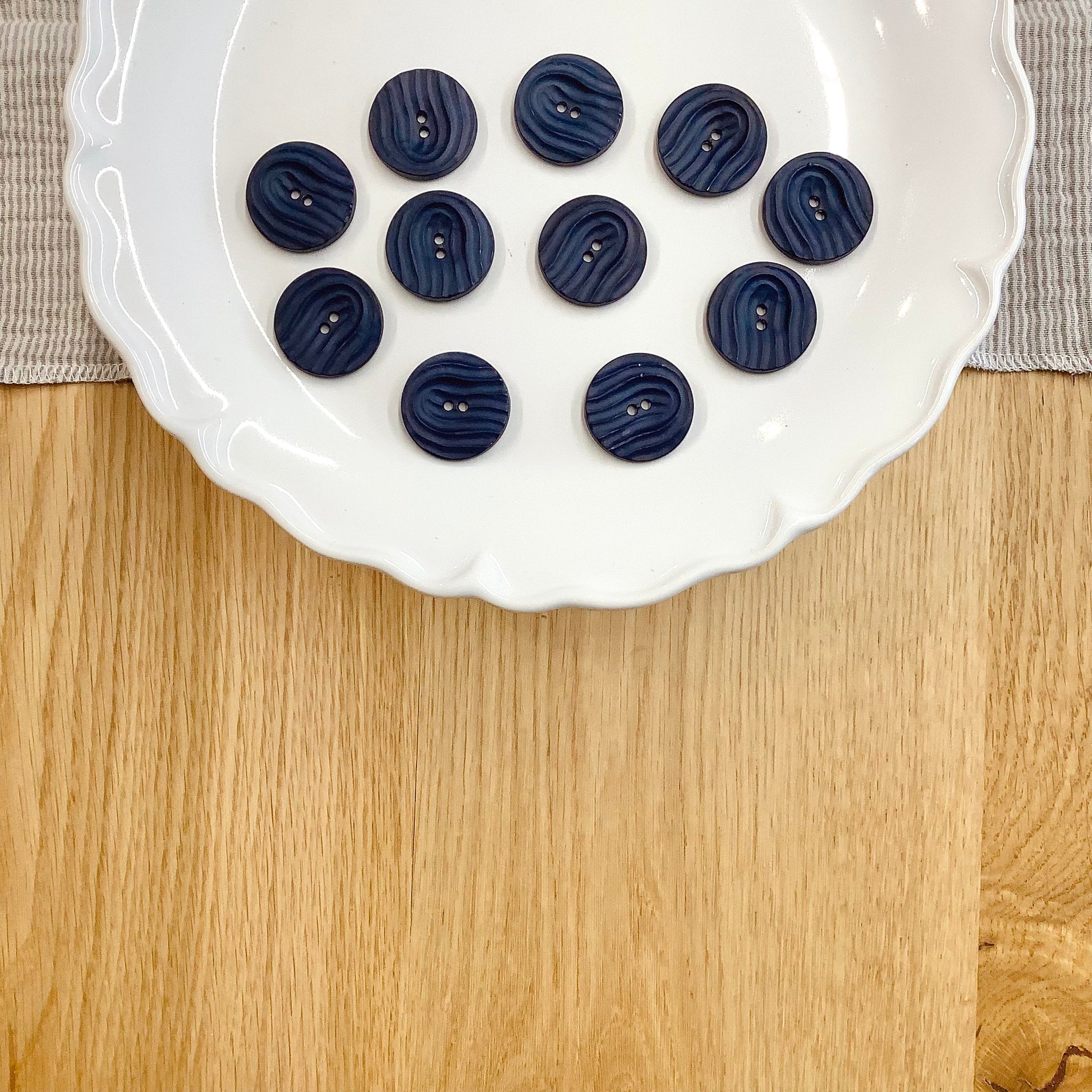 Elan ; Bouton 2 trous, noir, 25 mm