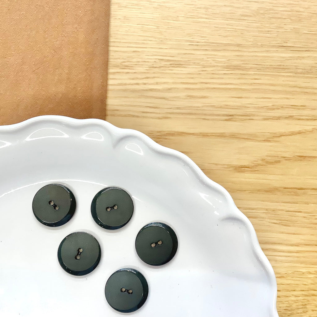 Elan ; Bouton 2 trous, noir, 23 mm