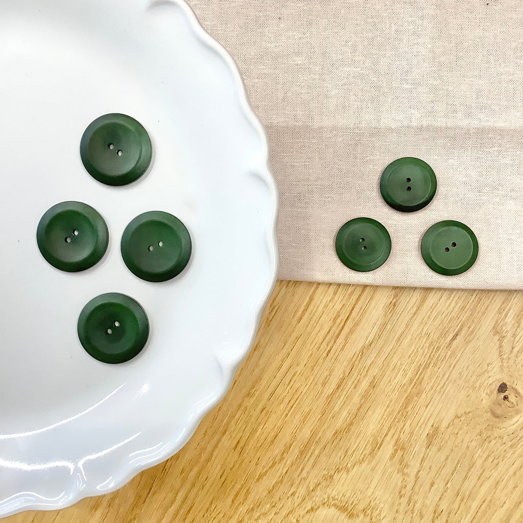 Elan ; Bouton à 2 trous, vert, 28 mm