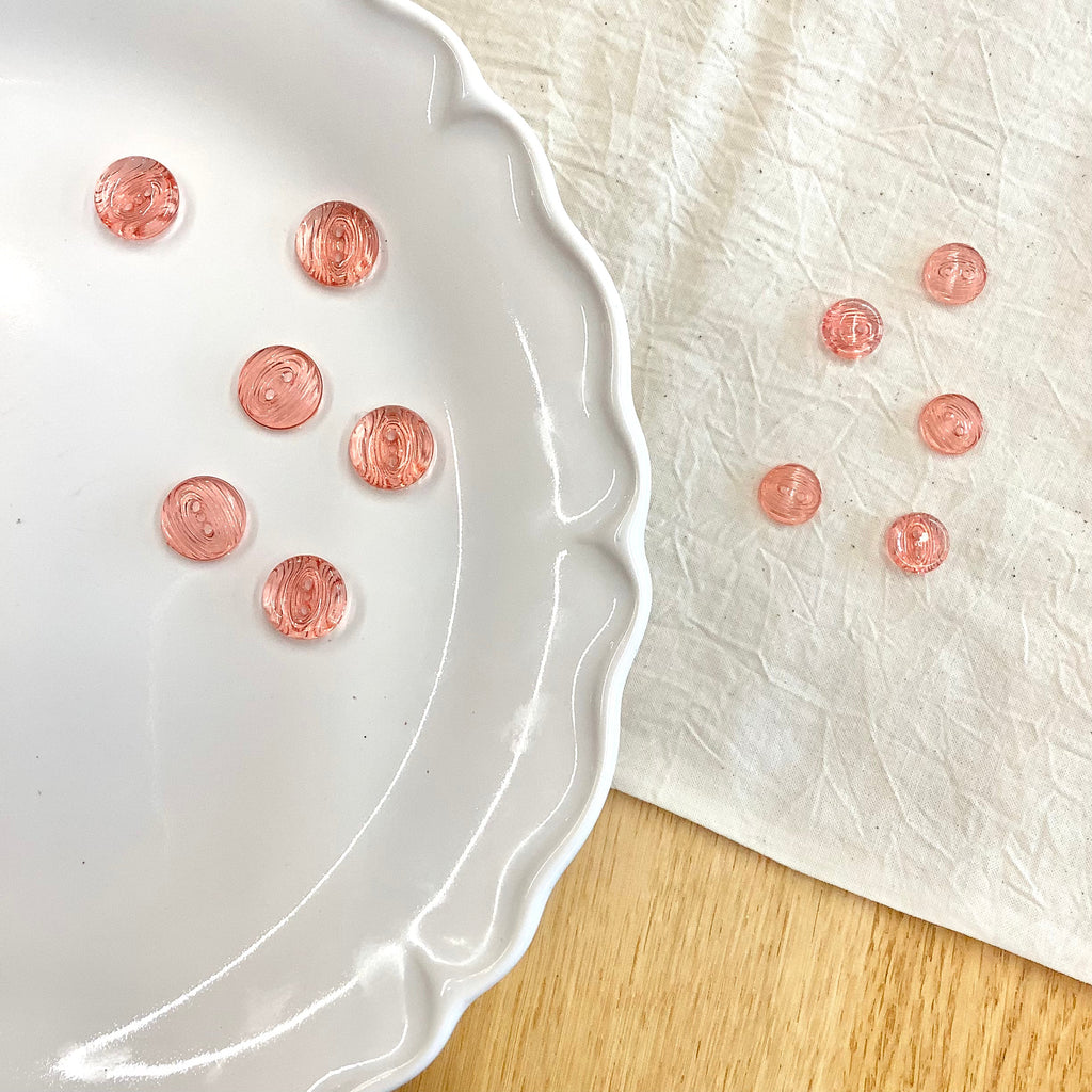 Elan ; Bouton à 2 trous, couleur pêche, 13 mm