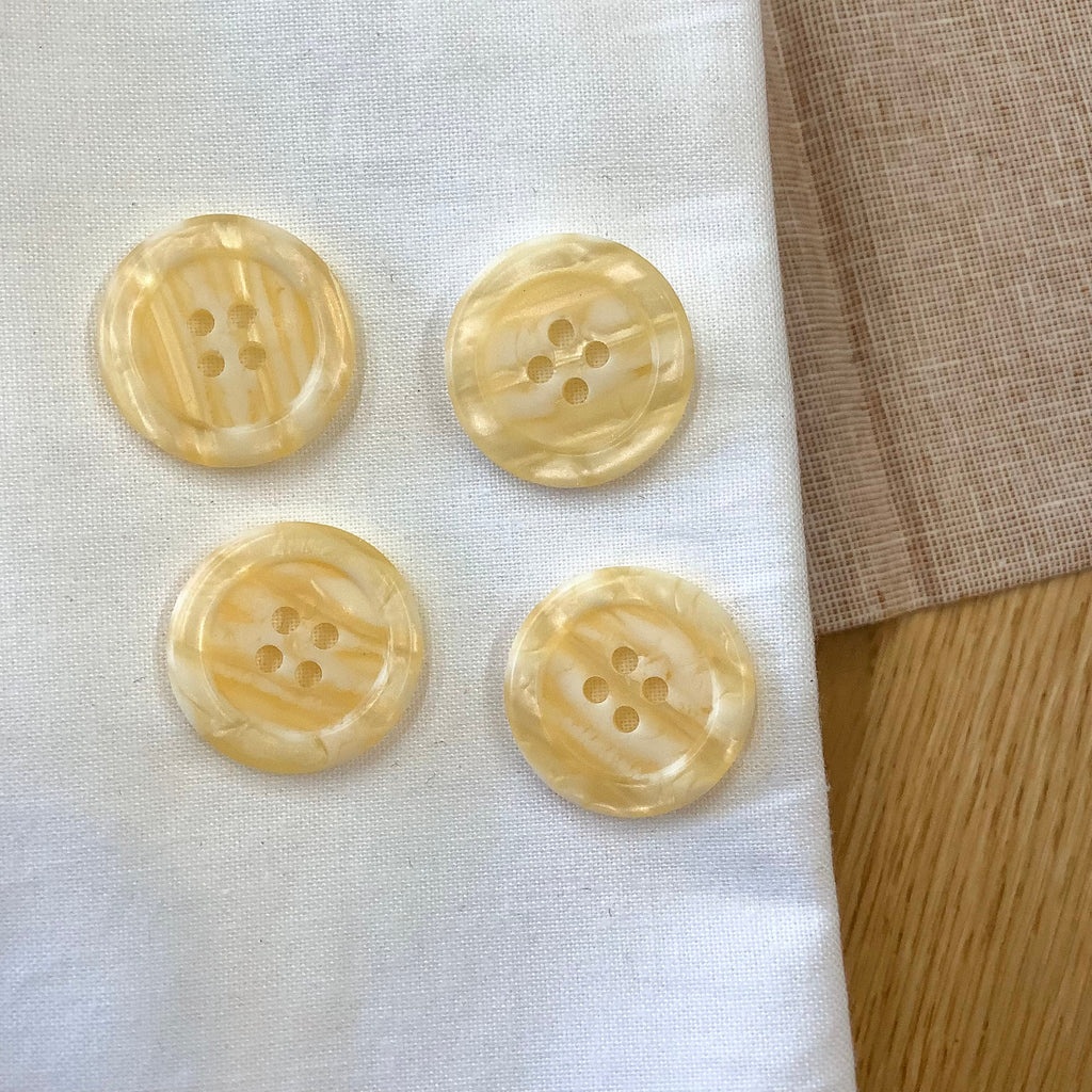 Elan ; Bouton 4 trous, jaune, 23 mm