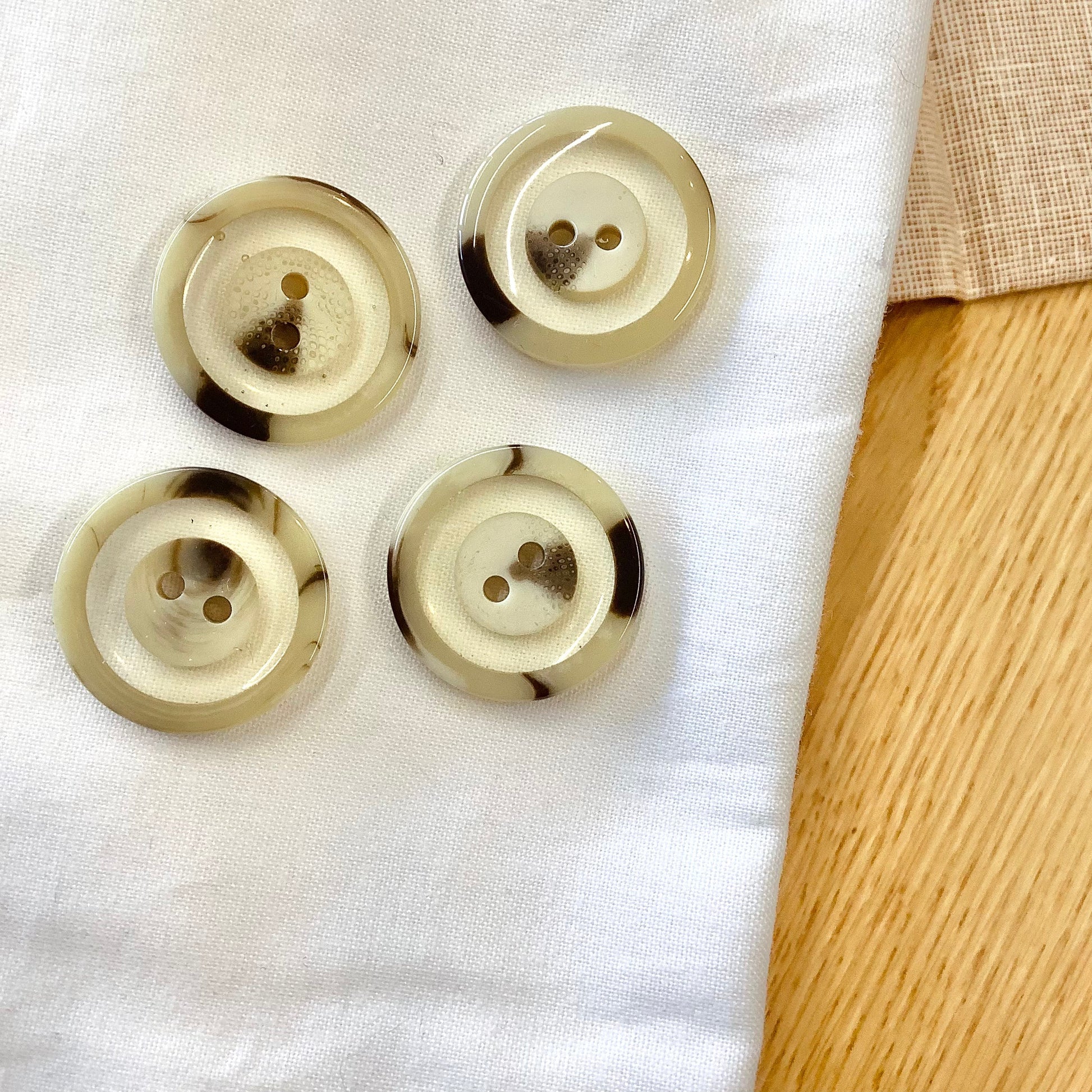 Elan ; bouton à 2 trous, ivoire, 25 mm