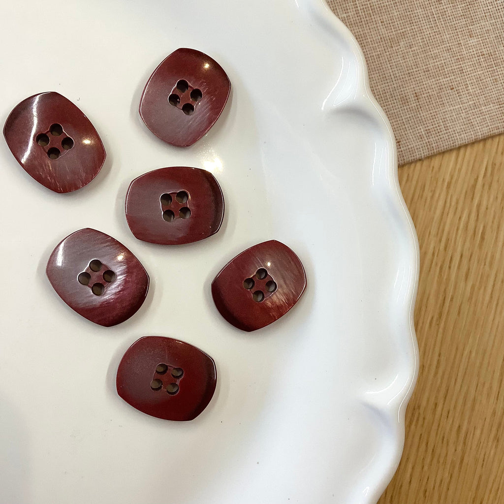 Elan ; Bouton 4 trous, bordeaux, 23 mm