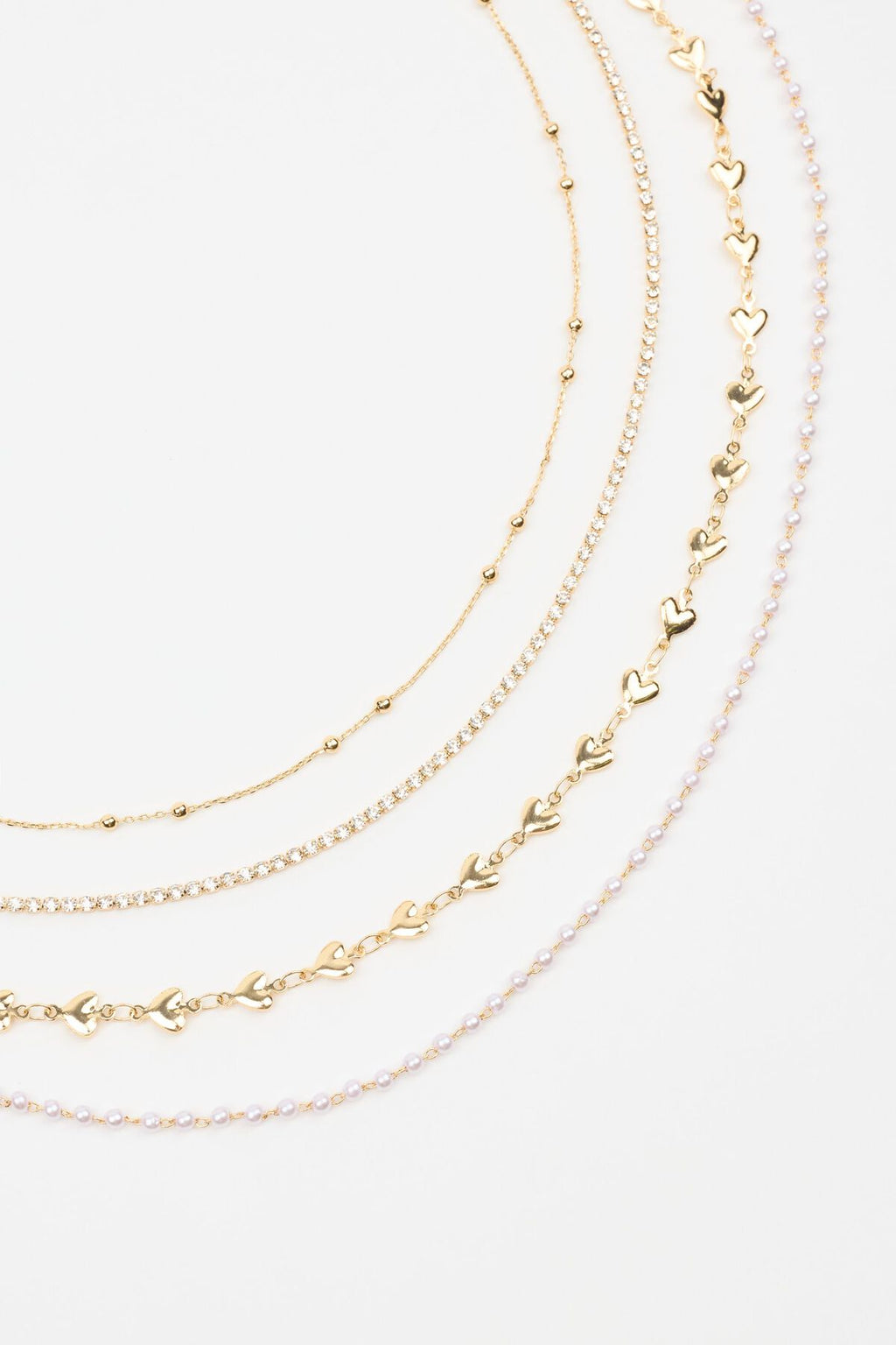 Ensemble de 4 chaînes cœurs, pierres précieuses et perles