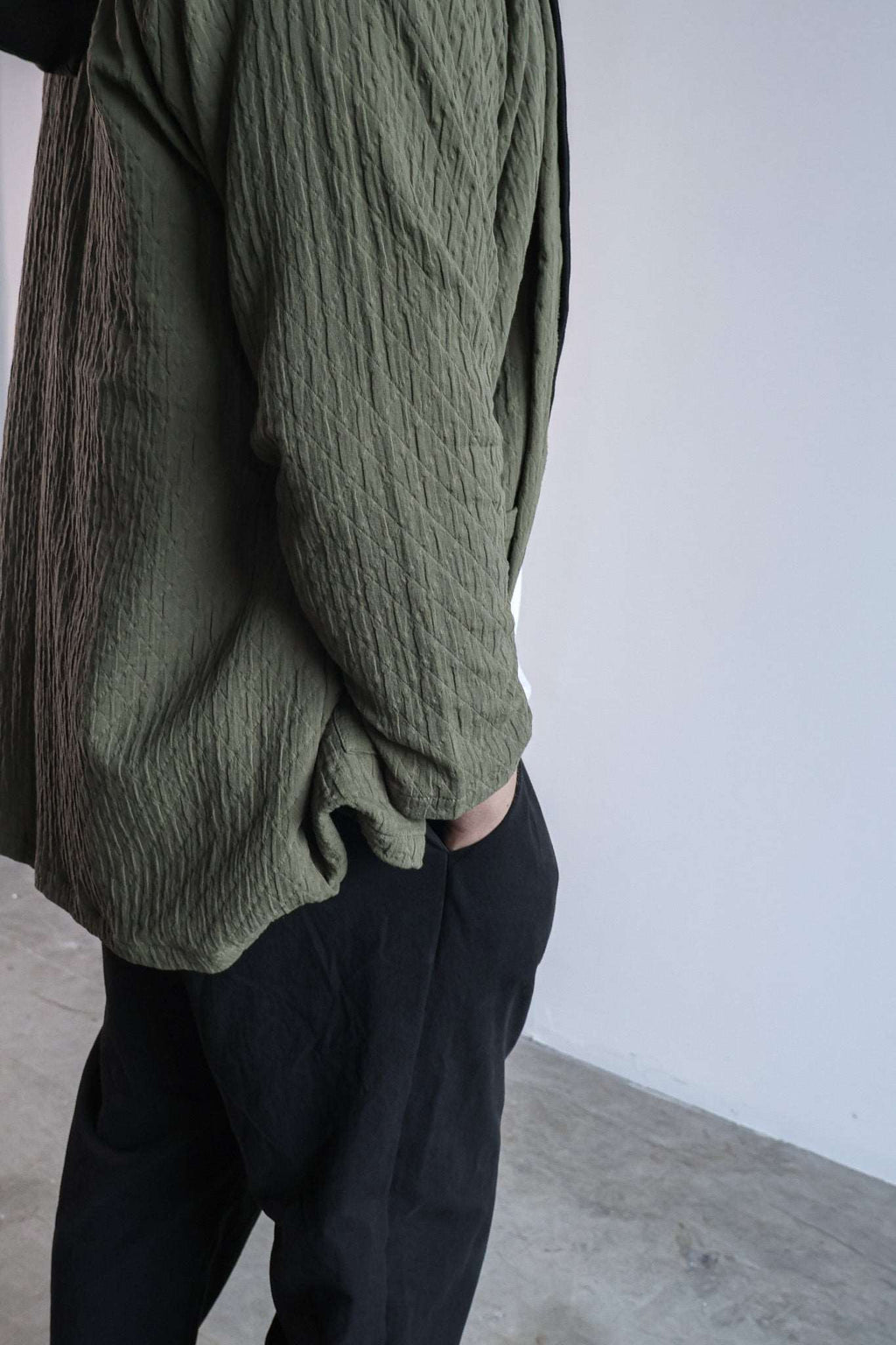 Le cardigan matelassé en coton biologique vert