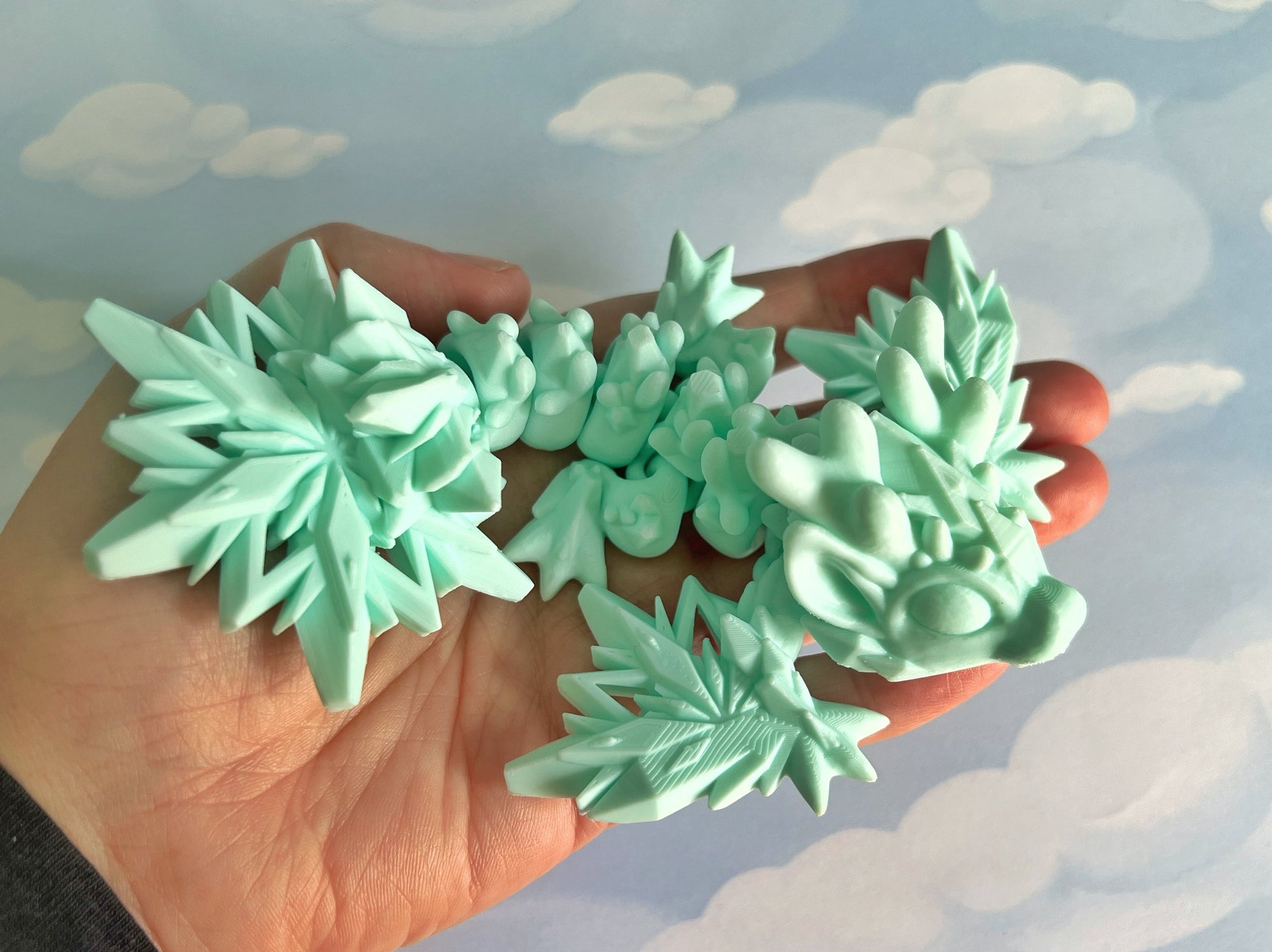 Tiny snowflake Winter Wyvern and Dragon 3d printed adult fidget and stim toy