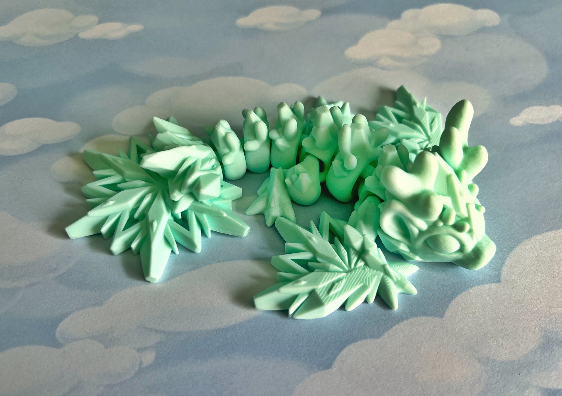 Tiny snowflake Winter Wyvern and Dragon 3d printed adult fidget and stim toy