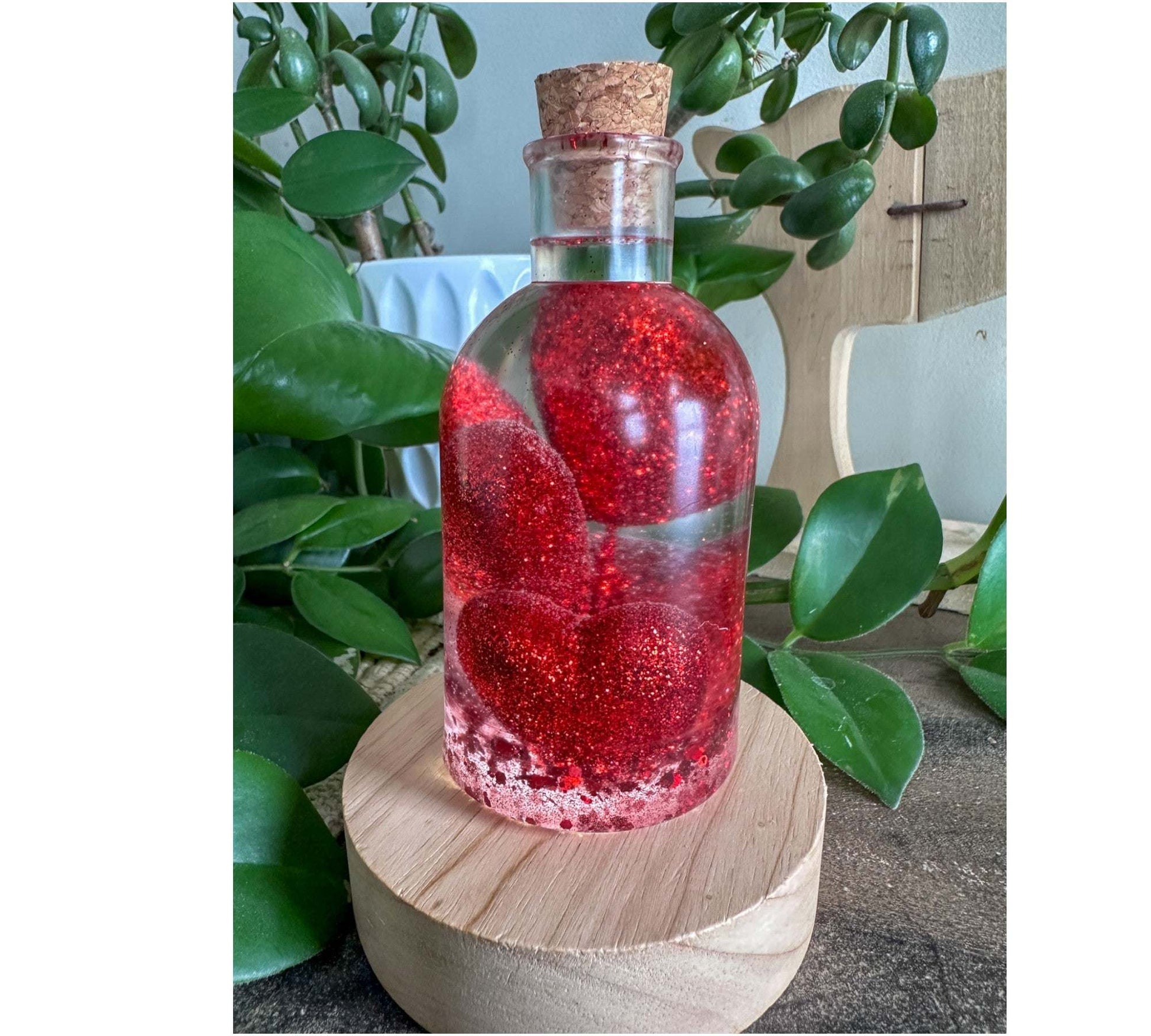 Bouteille en résine Love Potion - Décoration d'intérieur en forme de cœur scintillant faite à la main