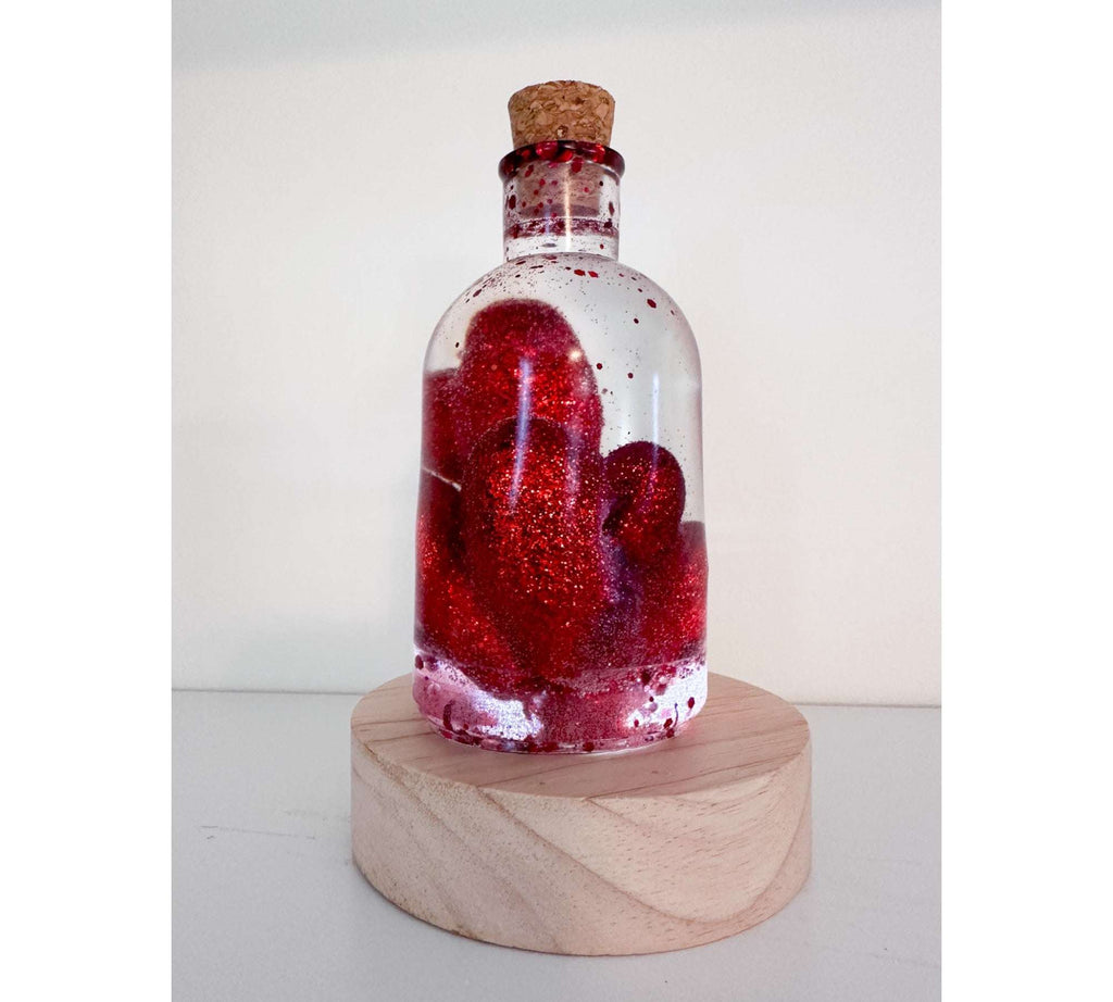 Bouteille en résine Love Potion - Décoration d'intérieur en forme de cœur scintillant faite à la main