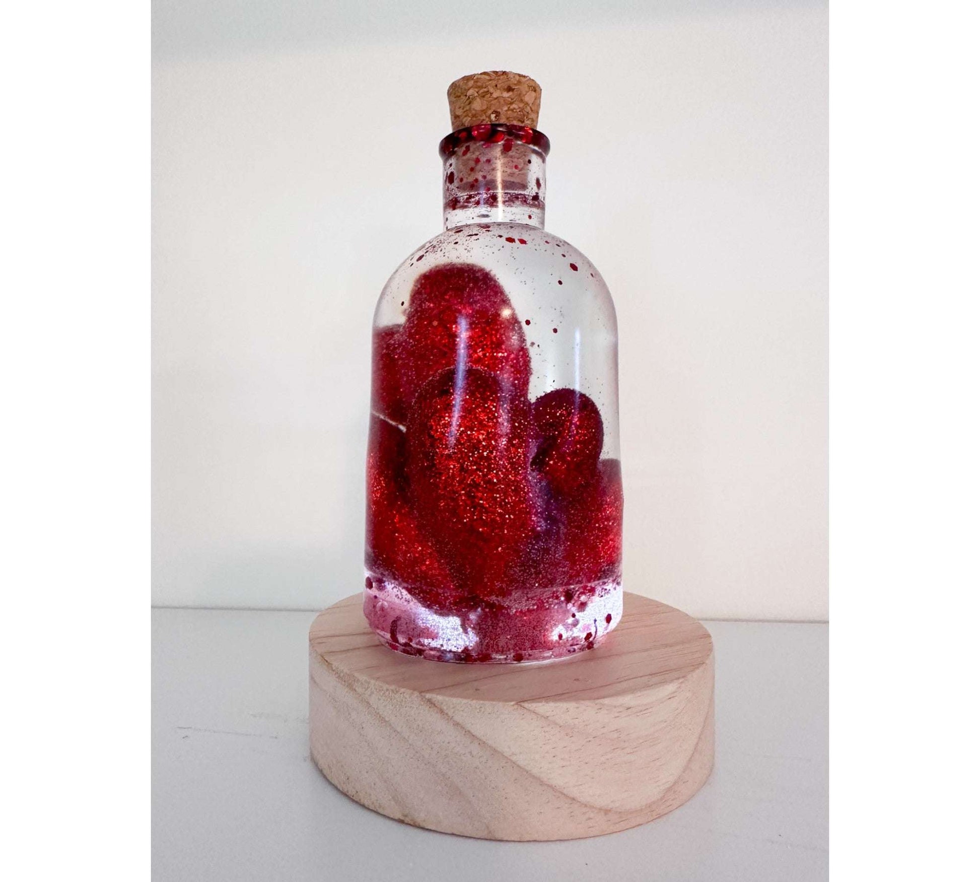 Bouteille en résine Love Potion - Décoration d'intérieur en forme de cœur scintillant faite à la main