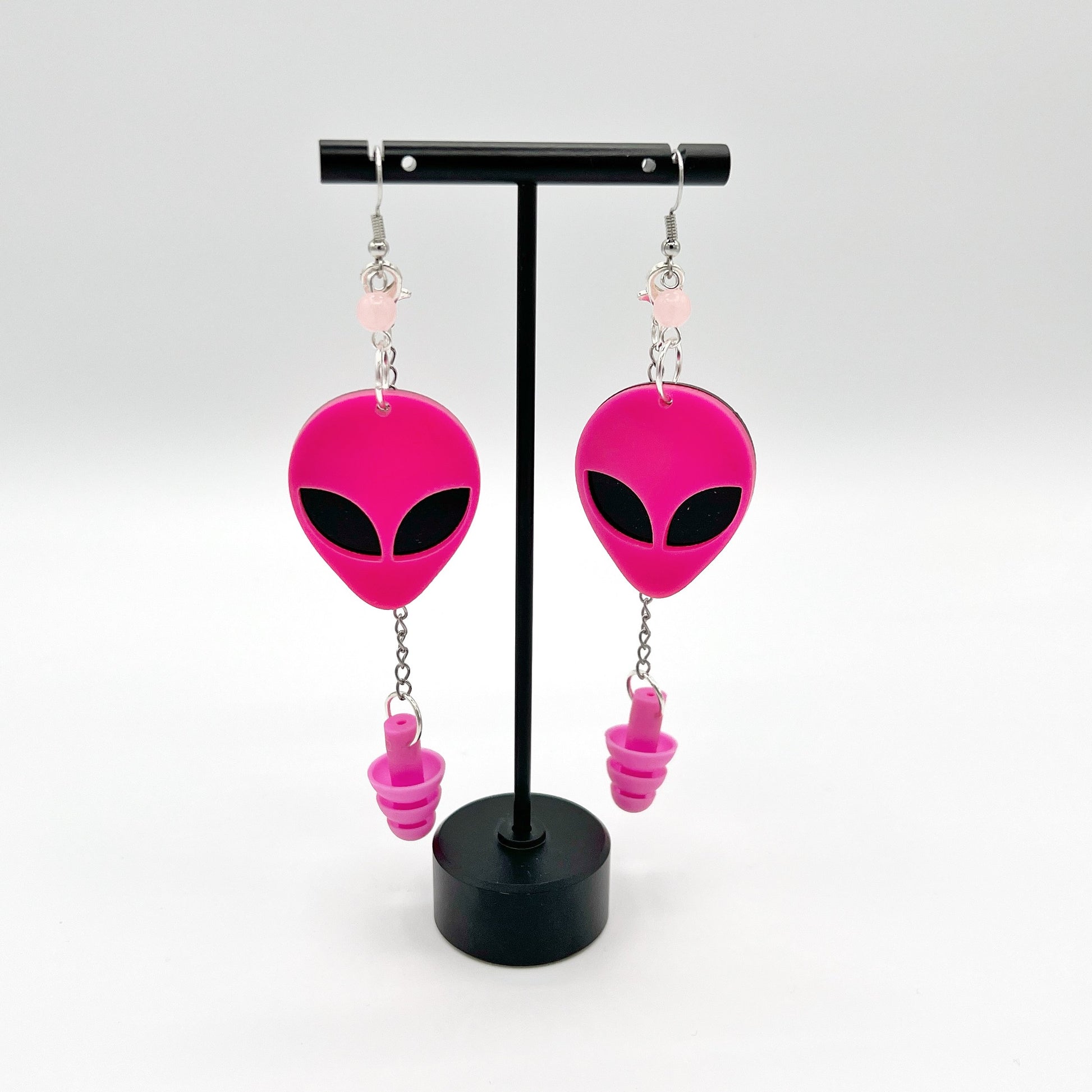 Boucles d'oreilles tête d'alien rose fluorescente UV – Style extra-terrestre et soutien sensoriel 