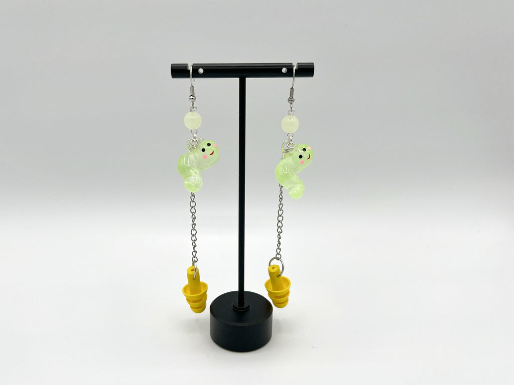 Boucles d'oreilles en forme de ver luisant – Protection auditive mignonne et fonctionnelle 