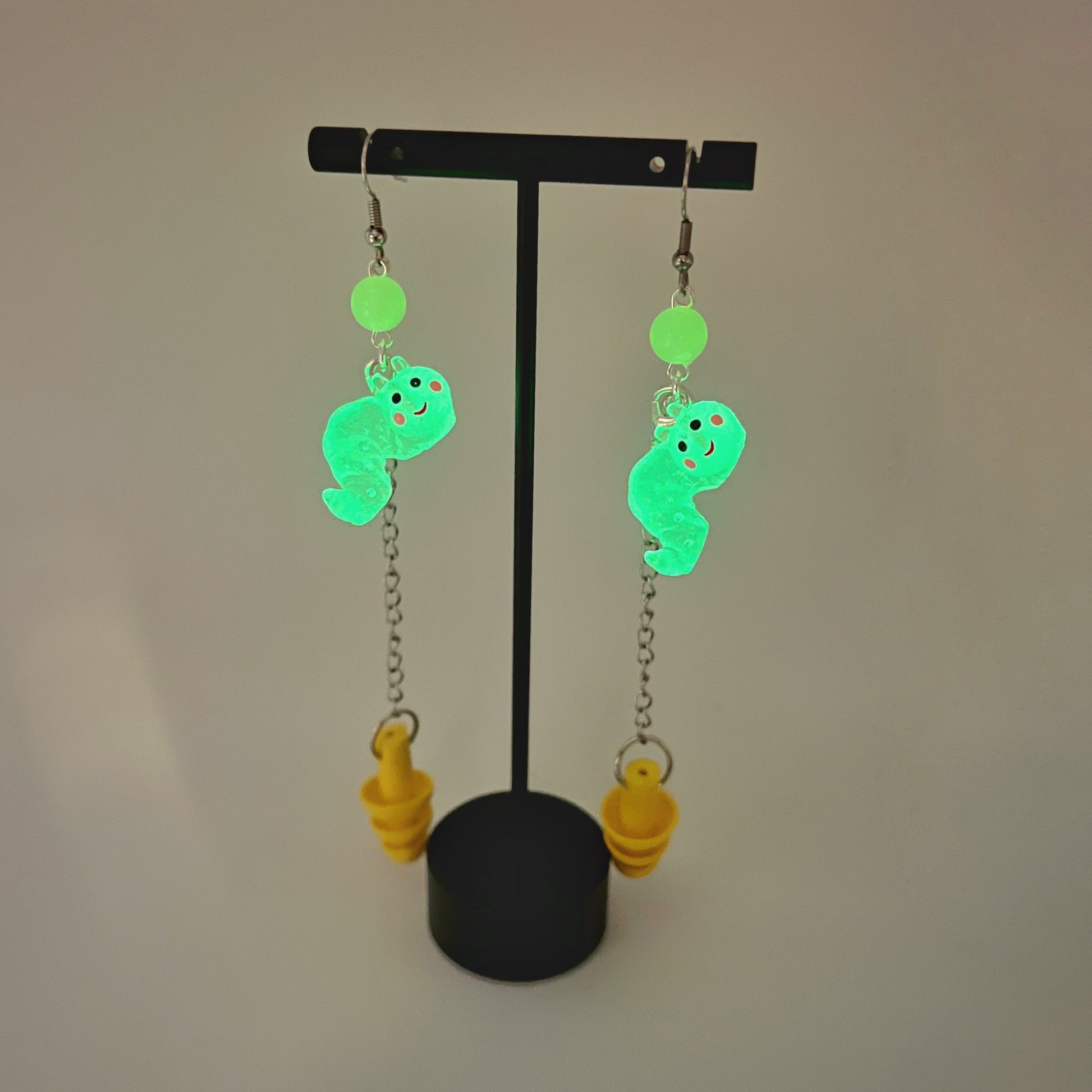 Boucles d'oreilles en forme de ver luisant – Protection auditive mignonne et fonctionnelle 