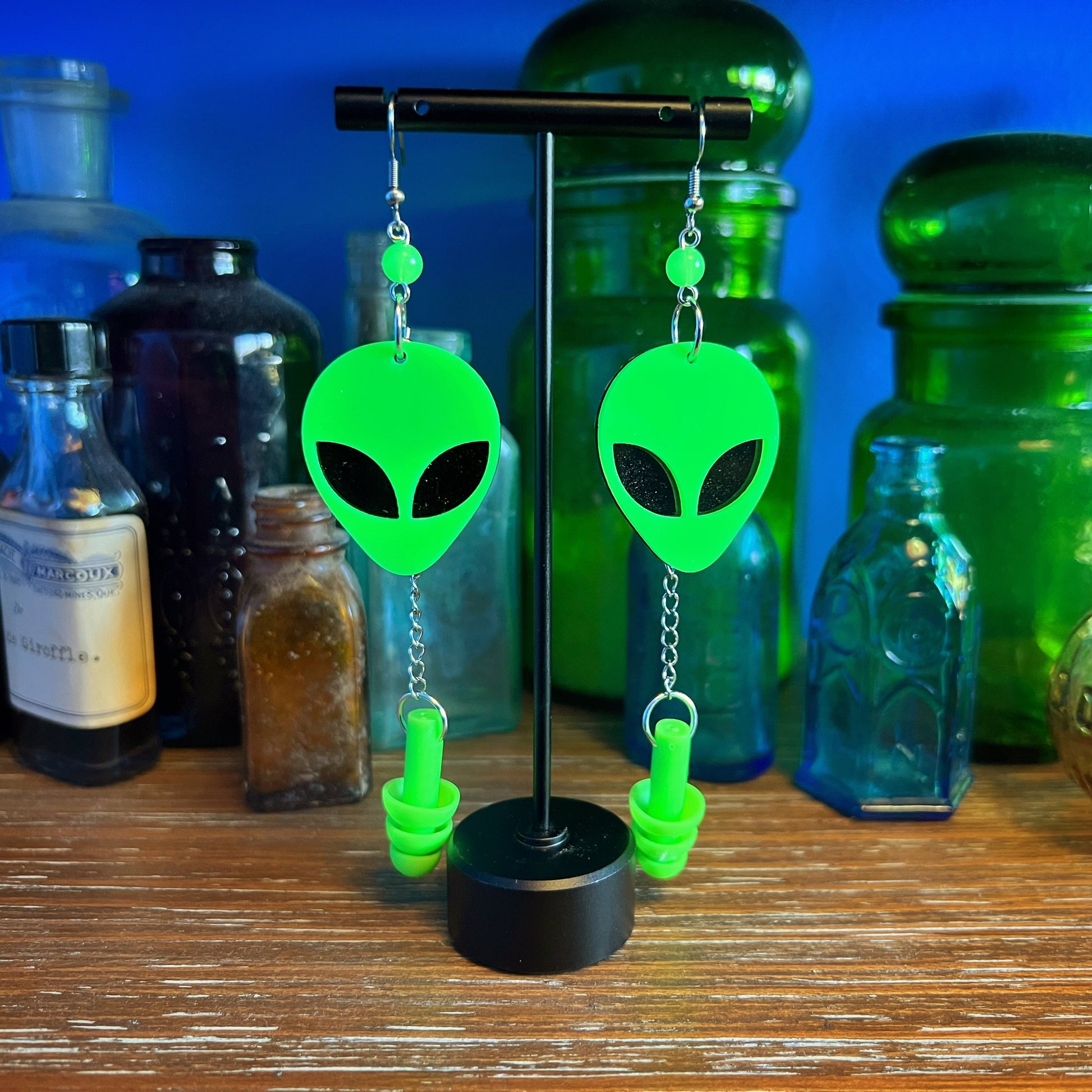 Boucles d'oreilles tête d'alien vertes fluorescentes UV – Style extra-terrestre et soutien sensoriel
