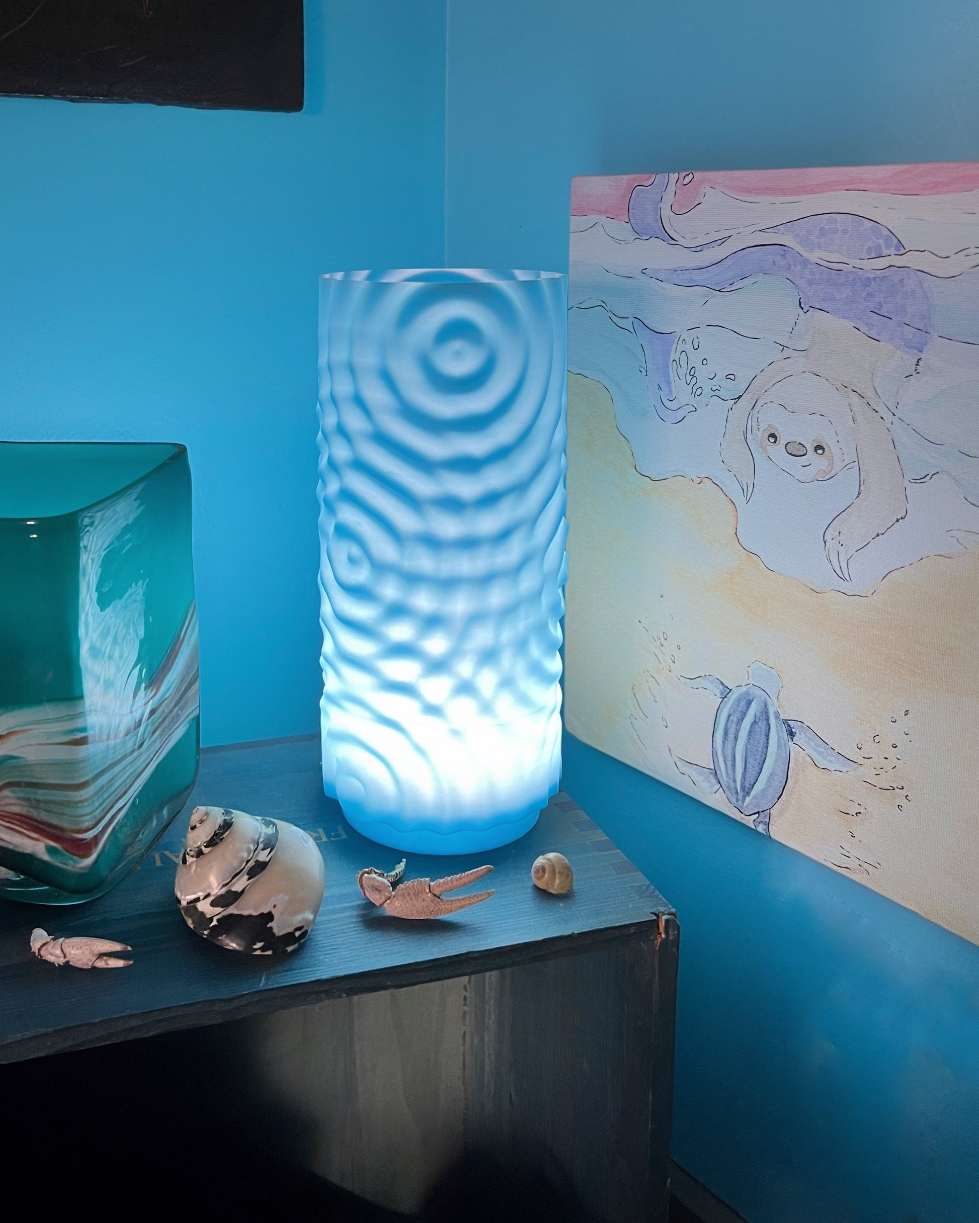 Lampe phosphorescente à effet ondulant sur l'eau – Une touche océanique fascinante 