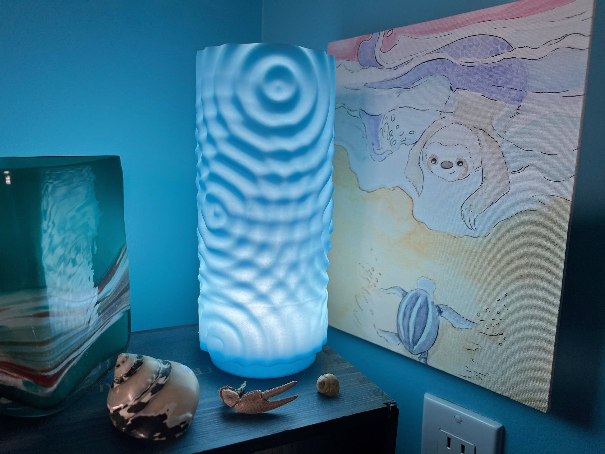 Lampe phosphorescente à effet ondulant sur l'eau – Une touche océanique fascinante 