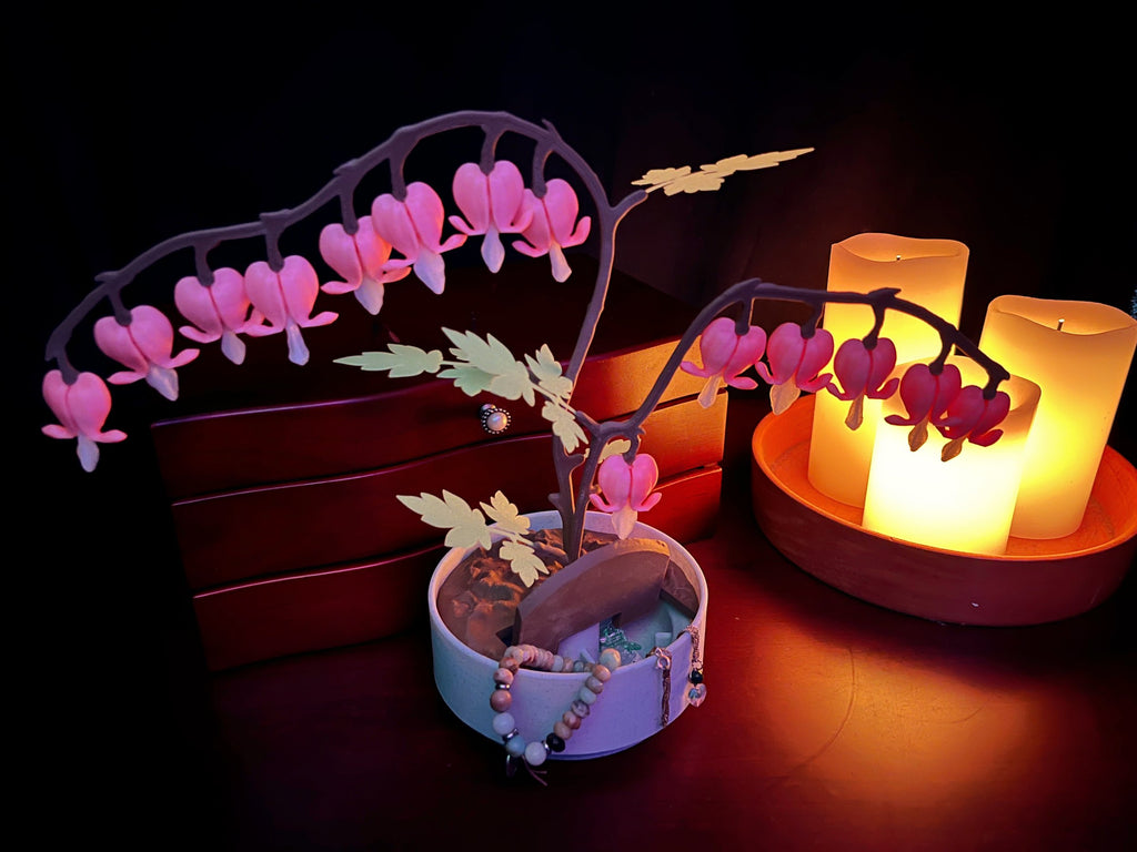 Calendrier de l'Avent et boîte à bijoux « Cœurs saignants » phosphorescents de 14 jours 