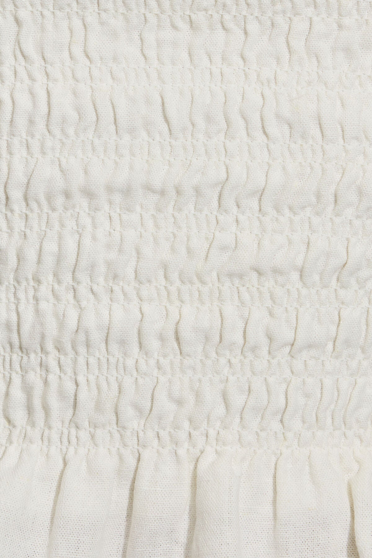 Haut tube smocké en lin