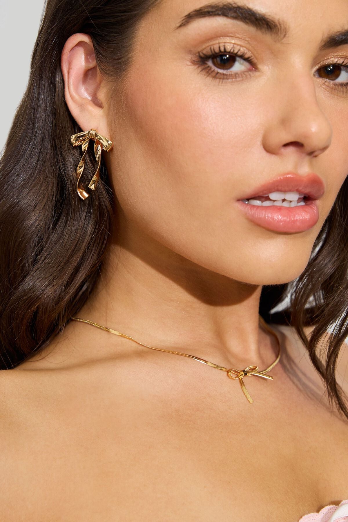 Boucles d'oreilles en métal avec nœud