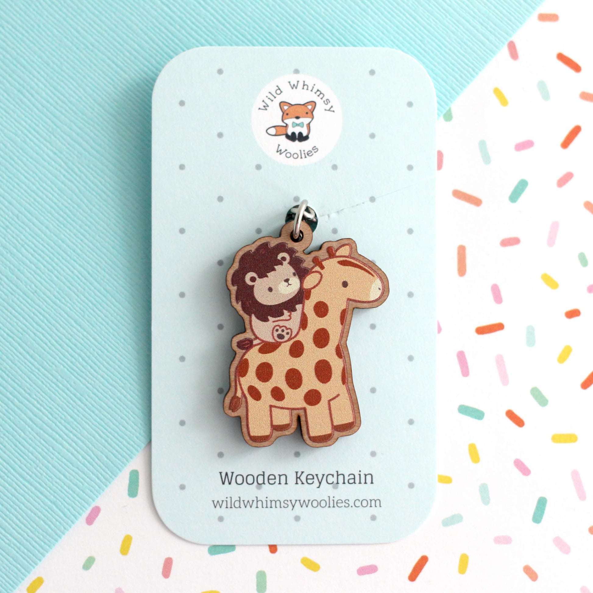 Porte-clés en bois Lion chevauchant une girafe
