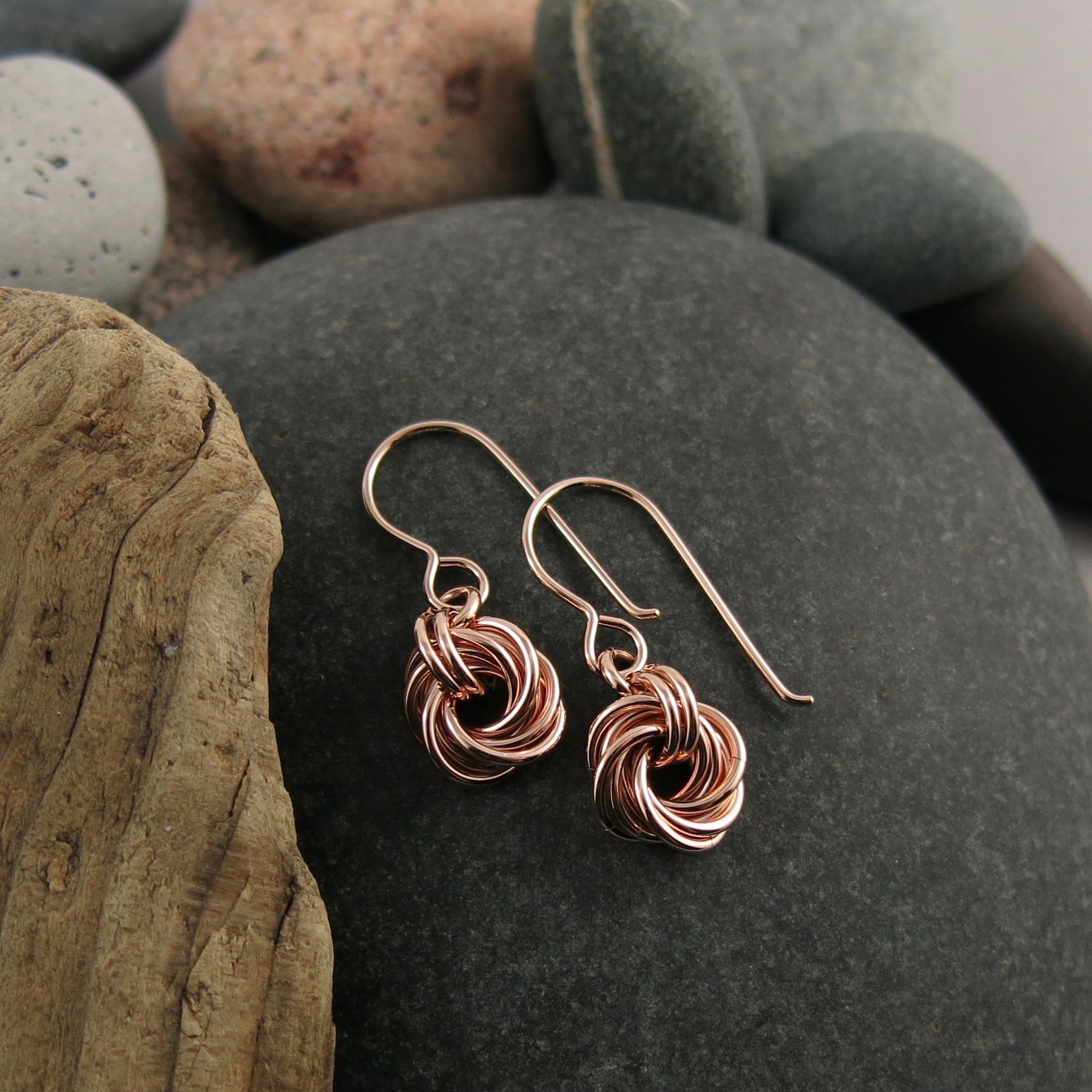 Boucles d'oreilles nœud d'amour sans fin • Or rose 14 carats