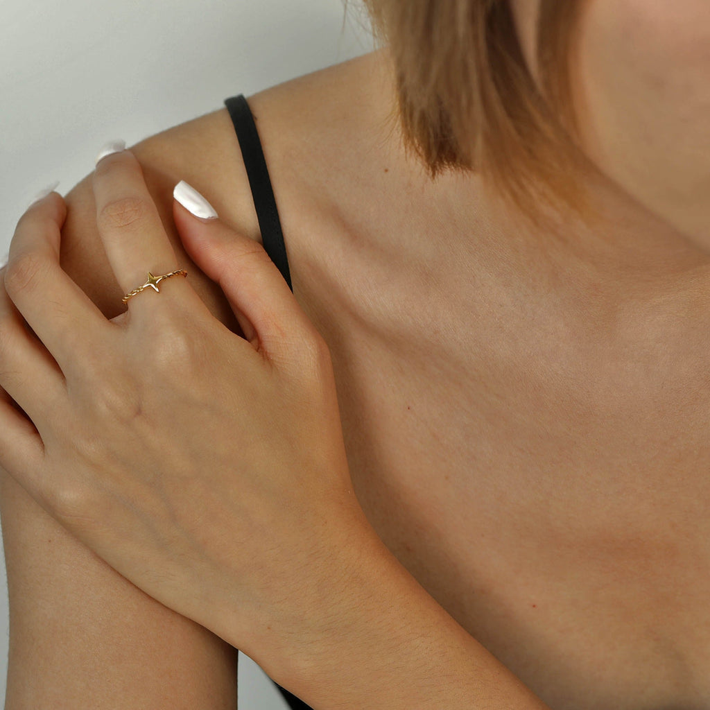 NICOLE Gold: Textured Ring with a Four Point Star Centre Piece