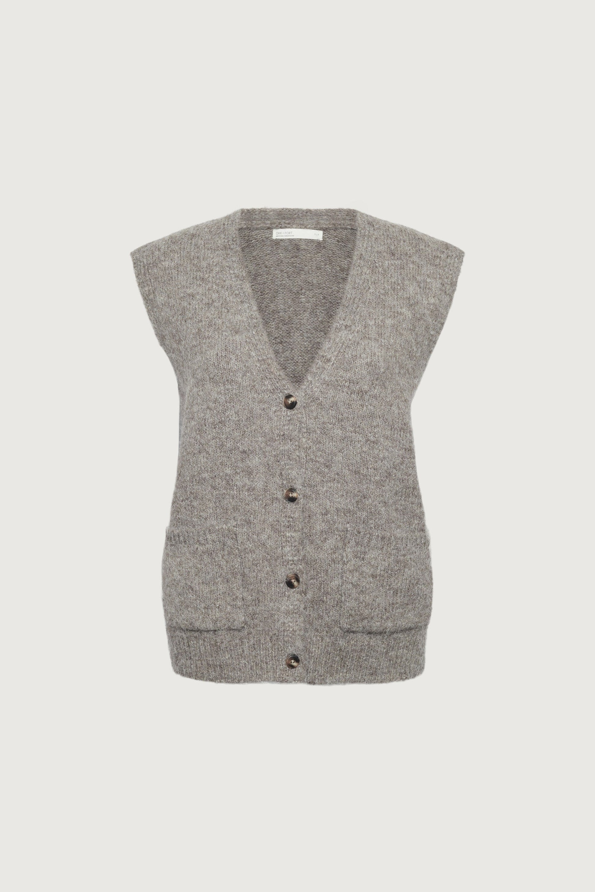 Gilet oversize à boutons sur le devant