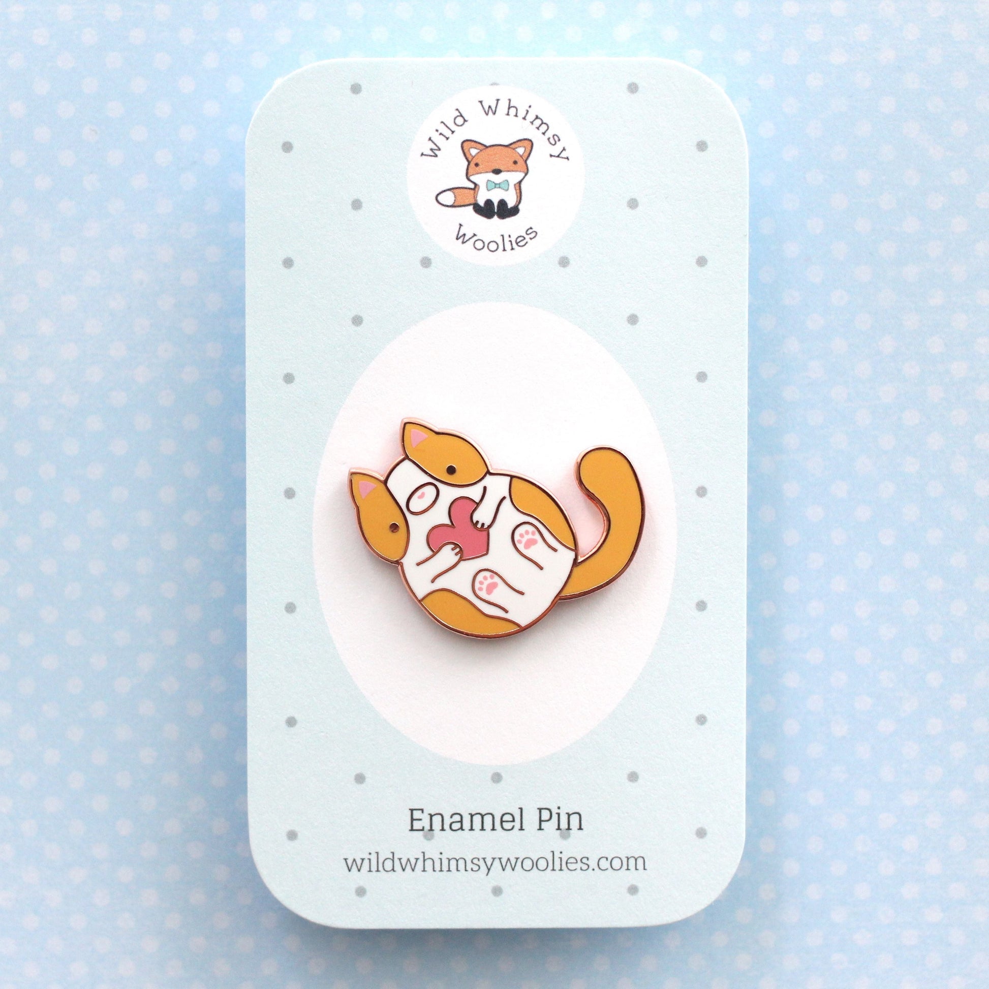 Pin's chat orange et blanc. Pin's en émail chaton