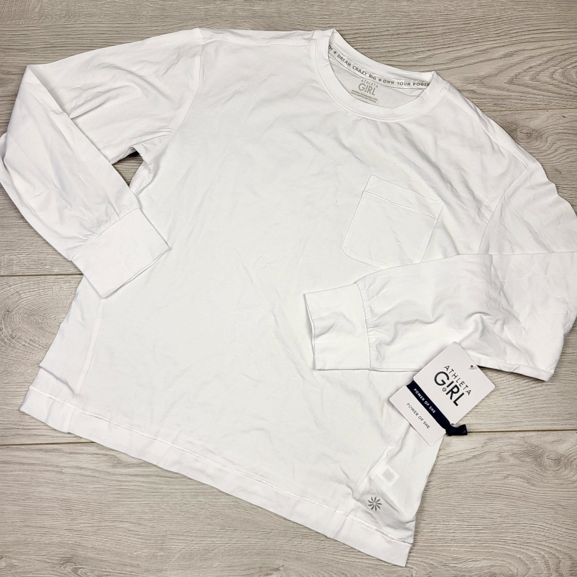 SHYS2 - NOUVEAU - Haut de sport blanc à manches longues Athleta Girl. Tailles 8-10 ans