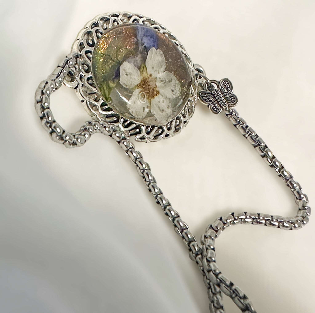 Silver Elegance: Handcrafted Resin Bracelet with Dried Flower Accents