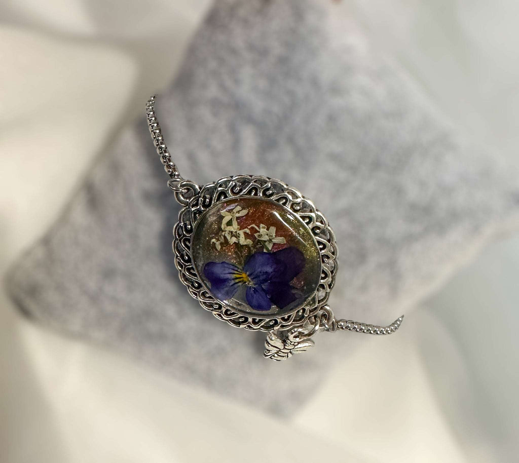 Silver Elegance: Handcrafted Resin Bracelet with Dried Flower Accents