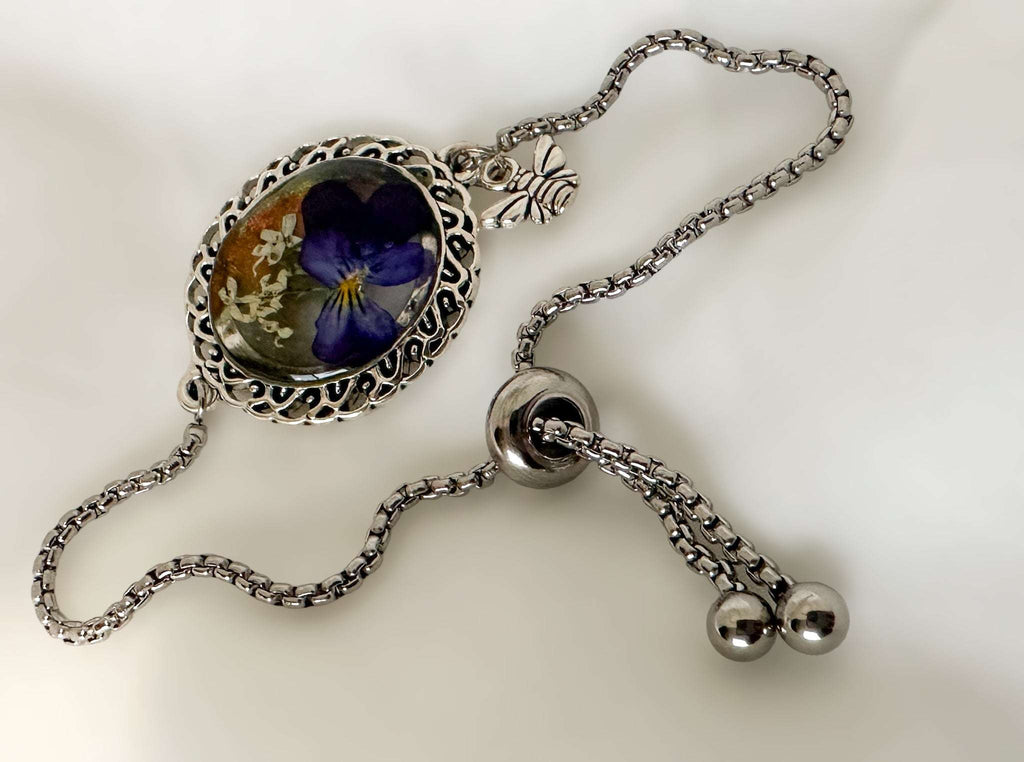 Silver Elegance: Handcrafted Resin Bracelet with Dried Flower Accents